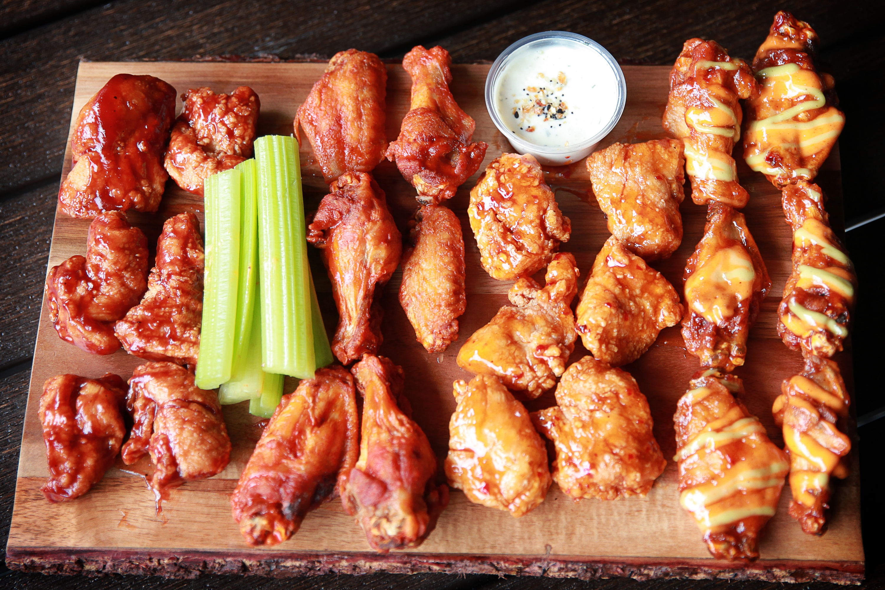 Order 24 Piece Wings food online from Over/Under Public House store, Burbank on bringmethat.com