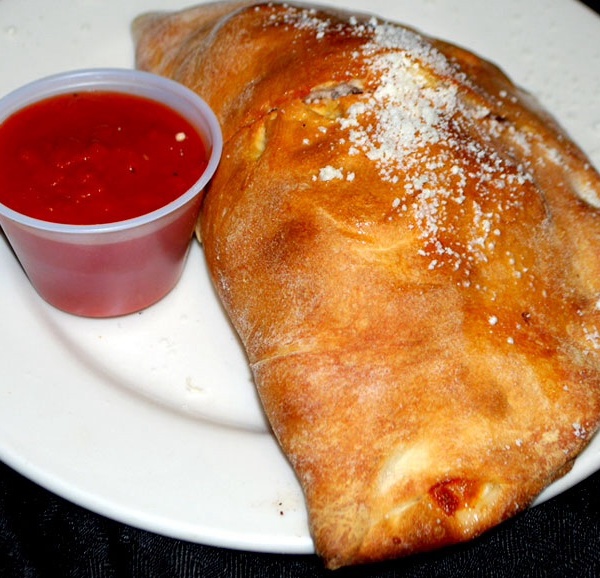 Order Create Your Own Stromboli food online from Johnny's Pizza store, Cary on bringmethat.com