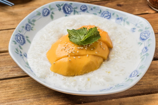 Order Sweet Rice with Mango food online from Bangkok Thai Cuisine store, Houston on bringmethat.com