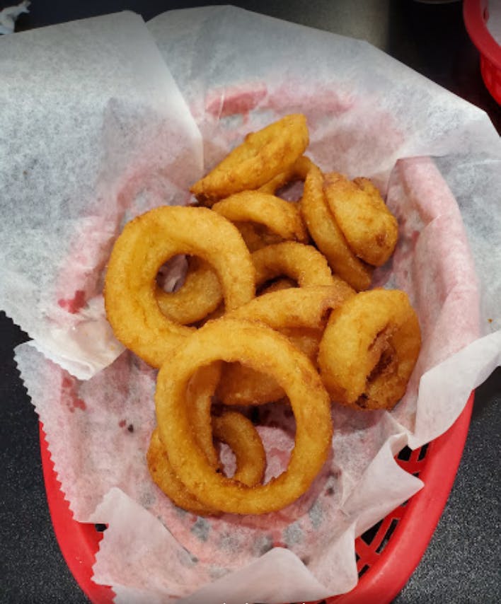 Order Onion Rings - Large food online from Mama's Pizza store, Fredericksburg on bringmethat.com