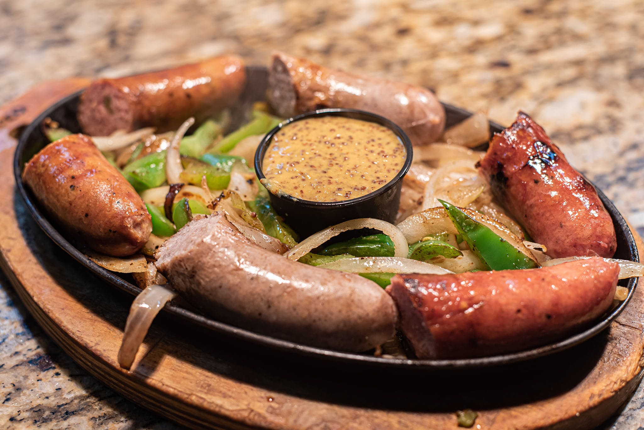 Order Sausage & Brat Trio - Appetizer food online from Craftsman Wood Fired Pizza store, Placentia on bringmethat.com