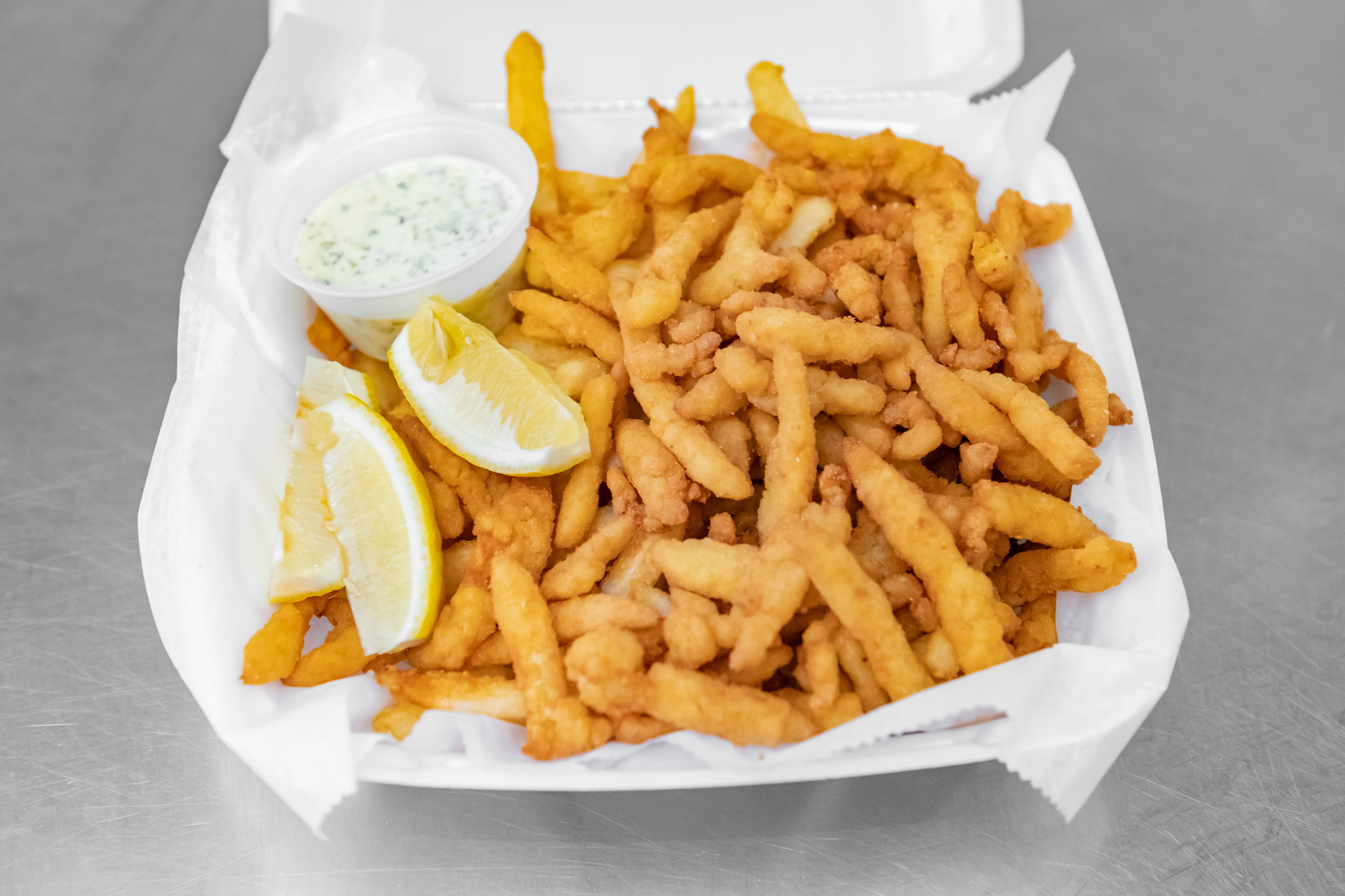 Order Fried Clam Strips - Appetizer food online from Legends Pizza store, Hamden on bringmethat.com