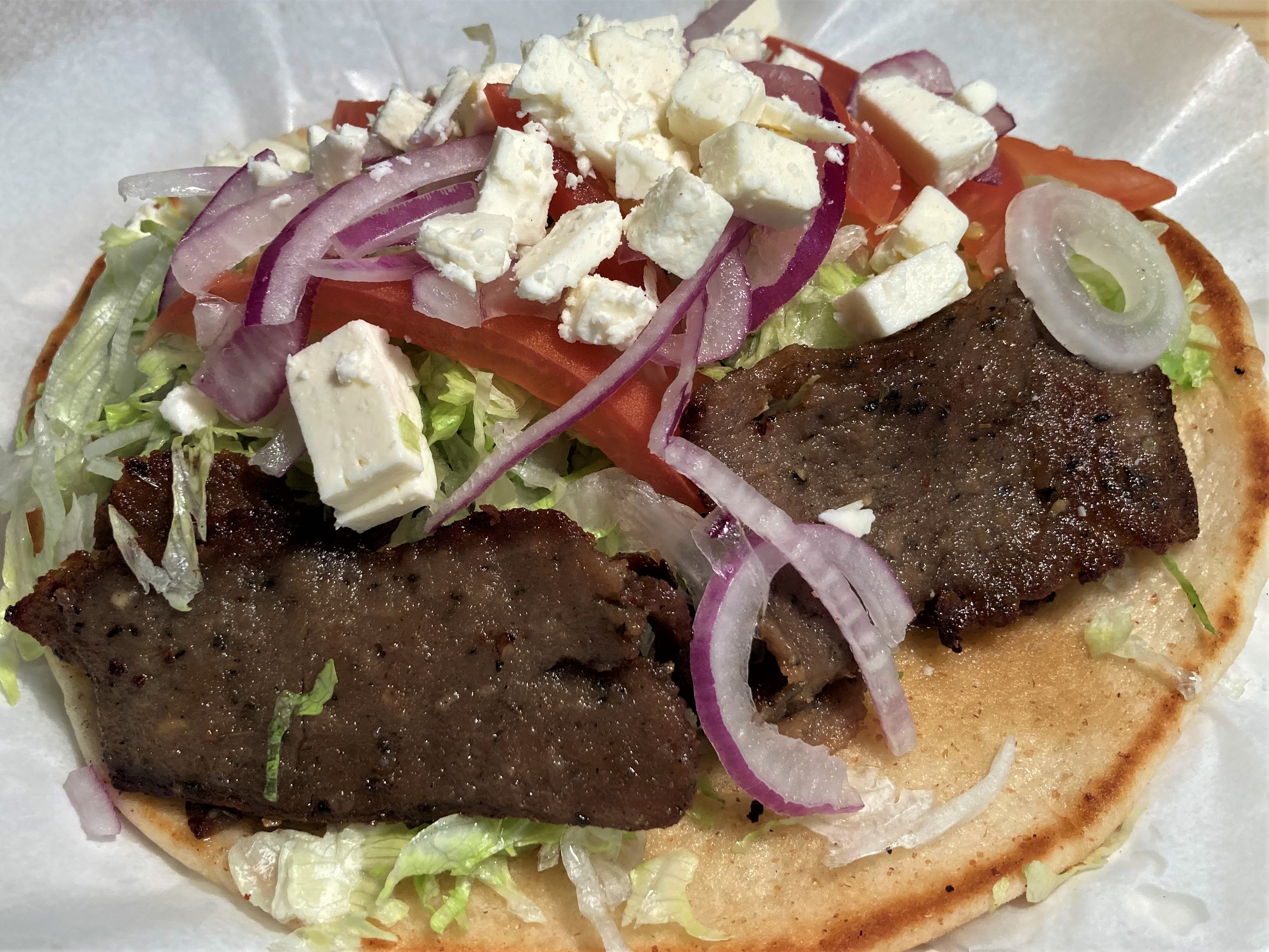 Order Gyro on Pita Bread Sandwich food online from Pizza Stop store, Silver Spring on bringmethat.com