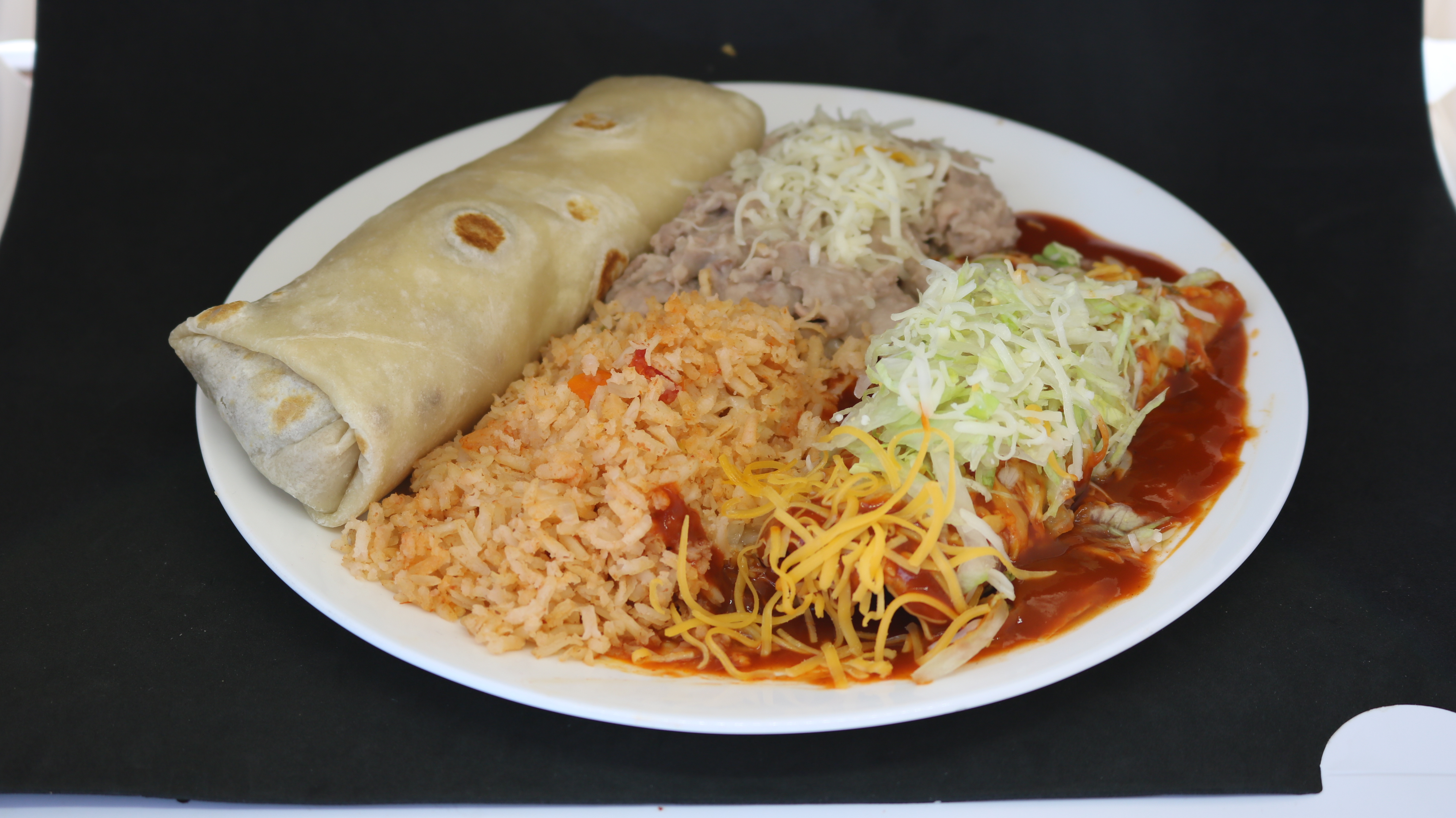 Order #6 Beef Burrito and Cheese Enchilada food online from Albertaco's Mexican Food Inc store, Cypress on bringmethat.com