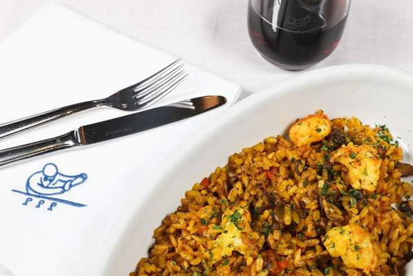 Order Riso Pilaf "alla Valenciana" with Shrimp, Mushrooms, Peppers and Saffron food online from Cipriani store, New York on bringmethat.com