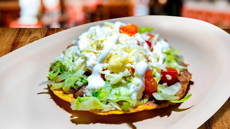 Order Tostada food online from Chilango Express store, West Allis on bringmethat.com