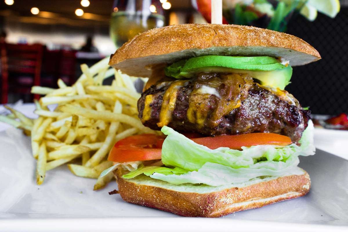 Order Charbroiled Cheeseburger - 1/2 lb. food online from Luxe Restaurant & World Famous Martini Bar store, Dana Point on bringmethat.com
