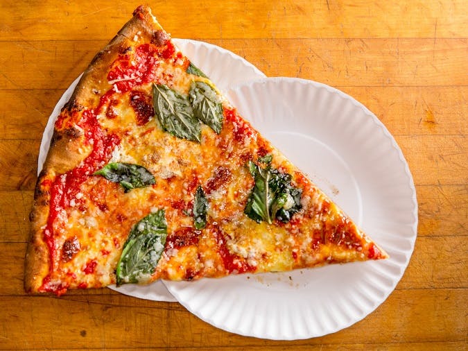 Order Margherita Pizza Slice - Slice food online from Artichoke Basille's Pizza store, New York on bringmethat.com
