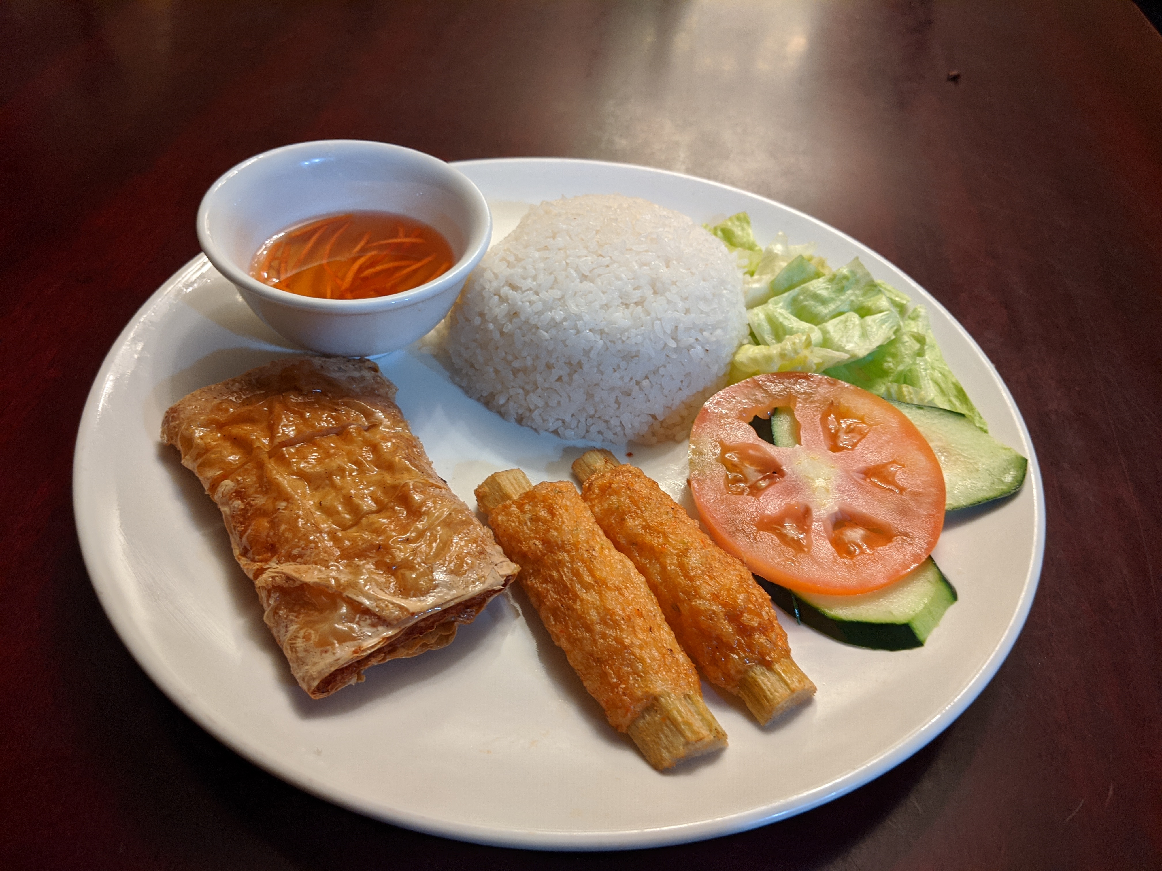 Order D9. Rice Platter with Shrimp Paste in Tofu Skin, Grilled Shrimp Sugarcane Skewer food online from Bac Lieu Restaurant store, San Francisco on bringmethat.com