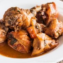 Order Stew Chicken with Roti food online from Limins Cafe Caribe store, East Orange on bringmethat.com