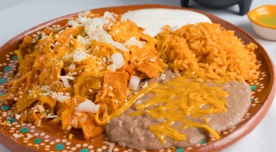 Order Red Chilaquiles Breakfast Plate food online from El Compadre Taco Shop & More store, La Mesa on bringmethat.com
