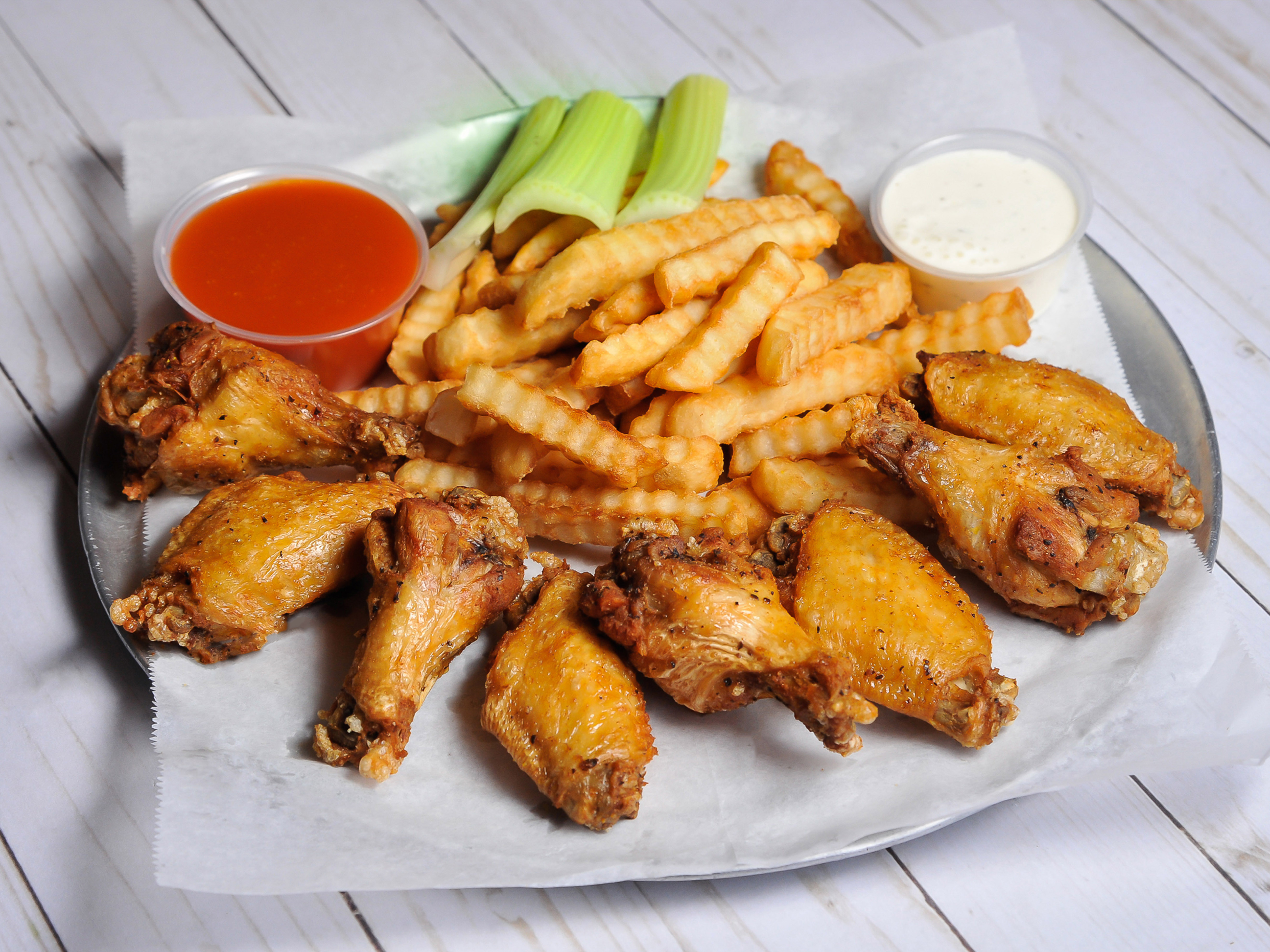 Order 8 Chicken Wings food online from Harrys Pizza And Subs store, Atlanta on bringmethat.com