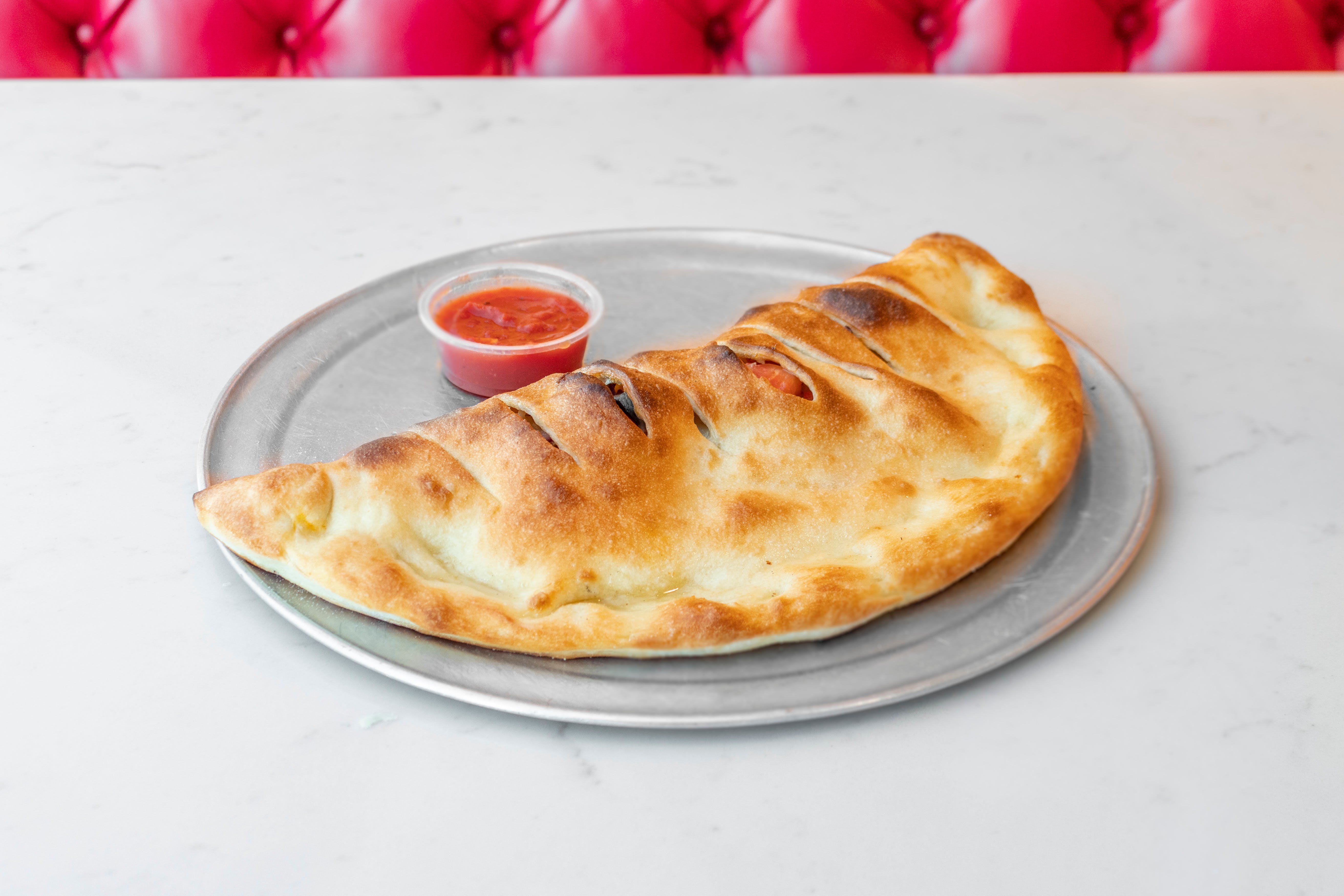 Order Vegetable Calzone - Calzone food online from Pizza Mark store, Los Angeles on bringmethat.com