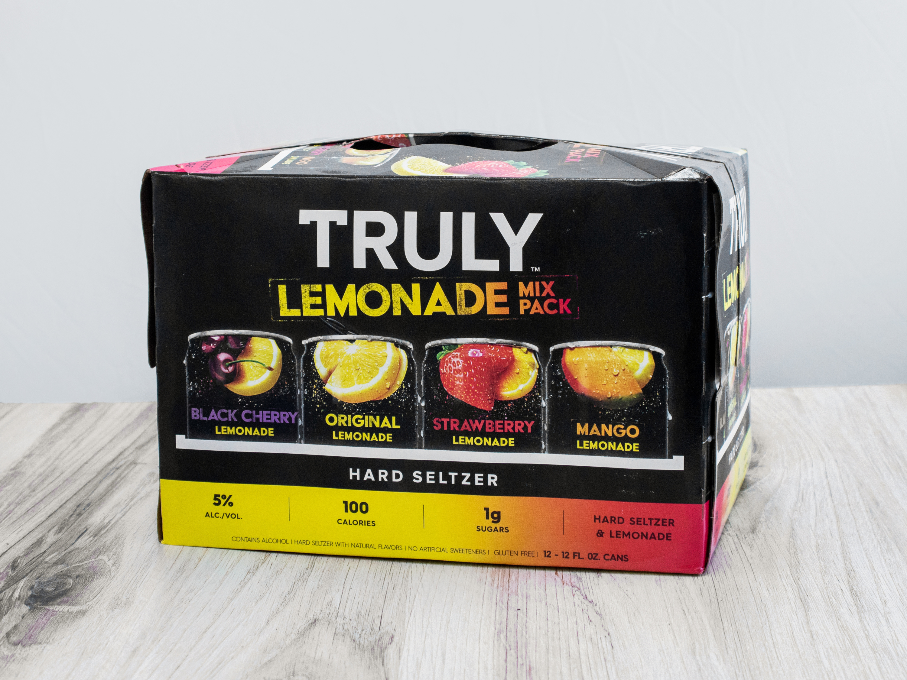Order Truly Spiked & Sparkling Lemonade & Seltzer Mix Pack  12 Pack and 12 fl oz. Slim Cans food online from Ok Liquor store, Lakewood on bringmethat.com