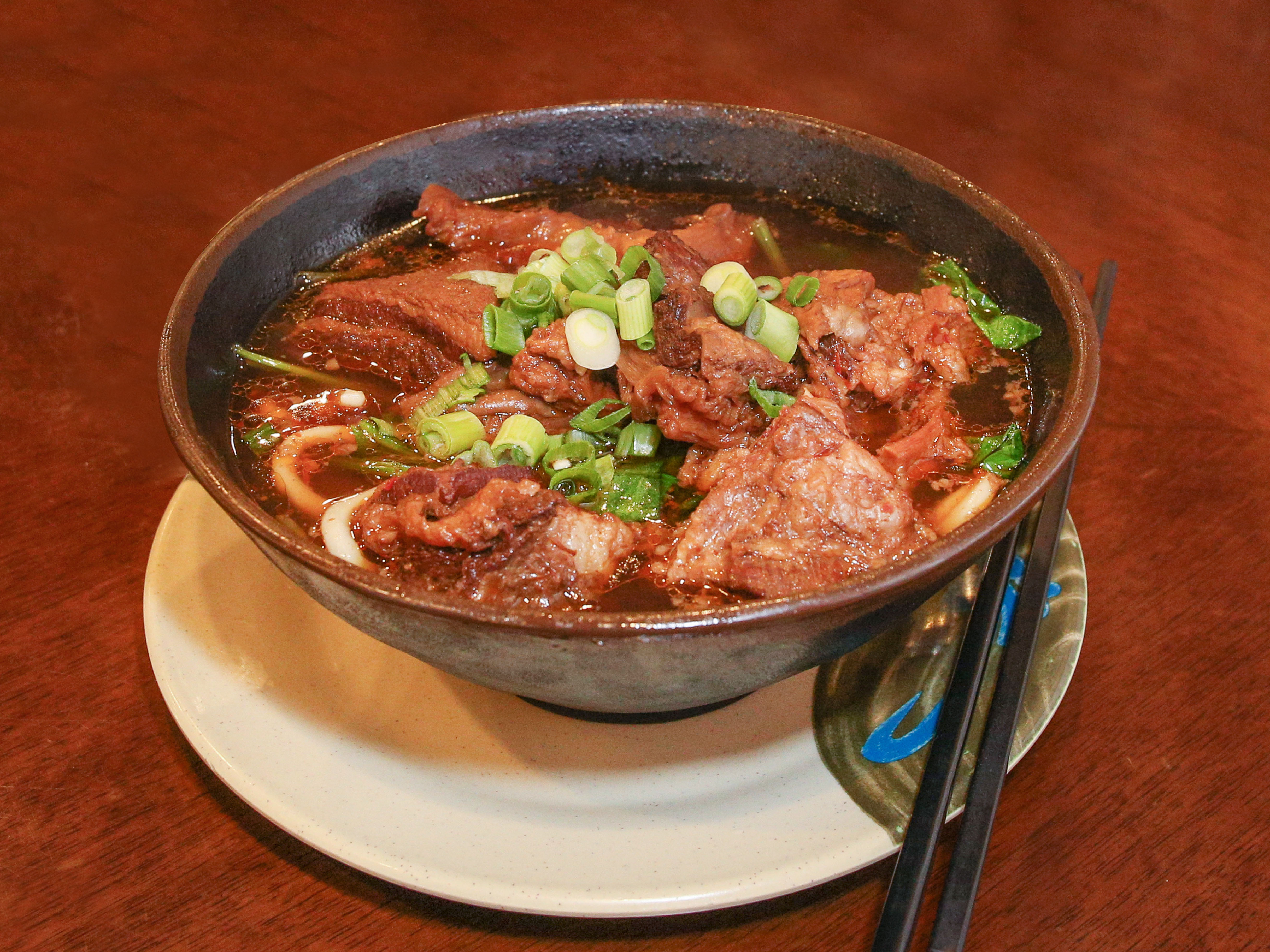 Order Szechuan Beef Noodle Soup food online from Queen House store, Mountain View on bringmethat.com