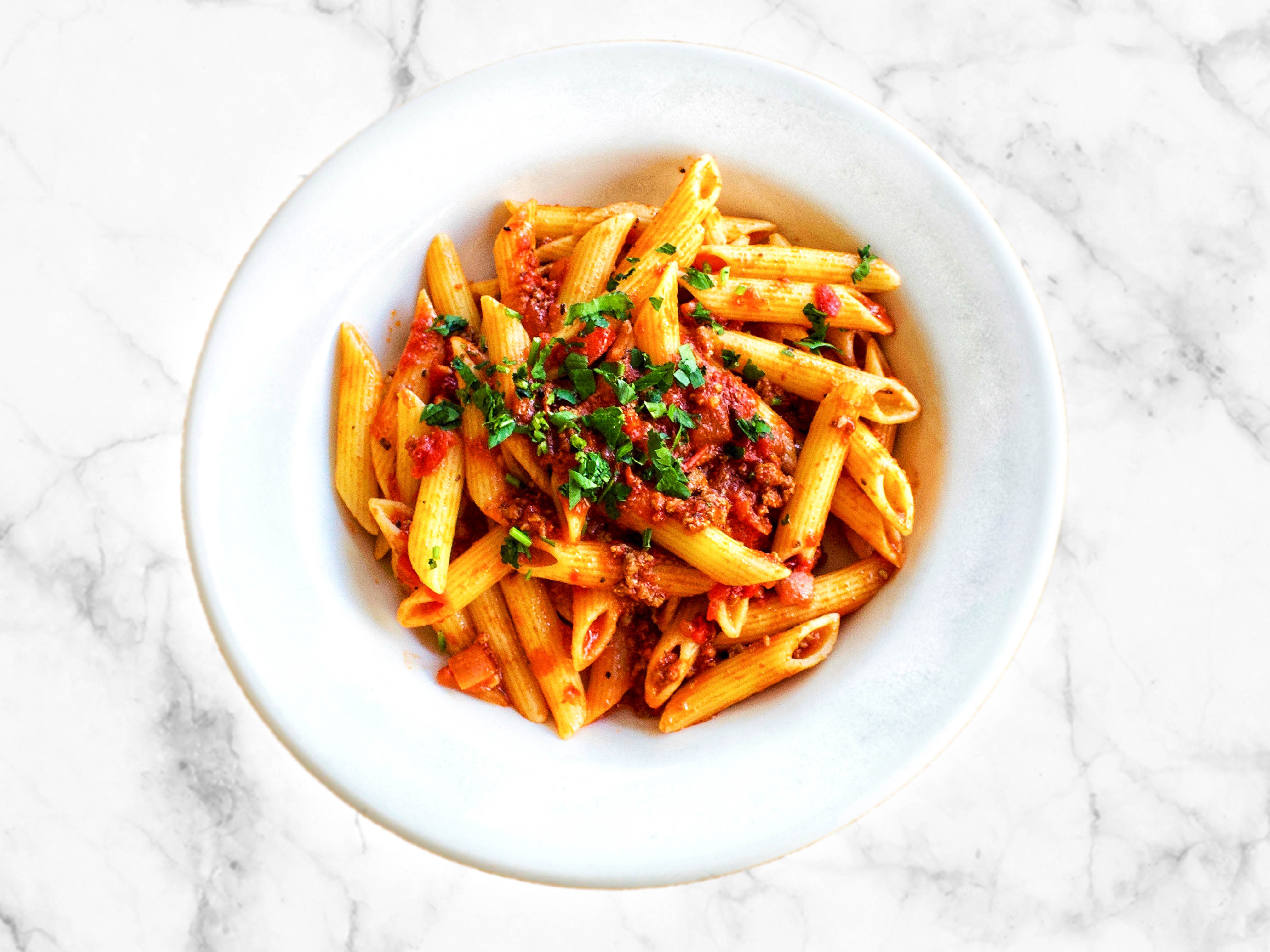 Order PENNE BOLOGNESE food online from Wings & Things By Amici store, Danville on bringmethat.com