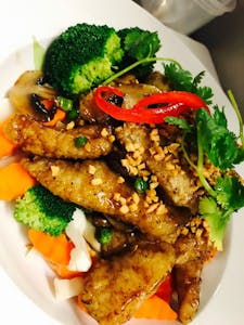 Order Thai Garlic Fish food online from Asian Thai Kitchen store, Miami on bringmethat.com