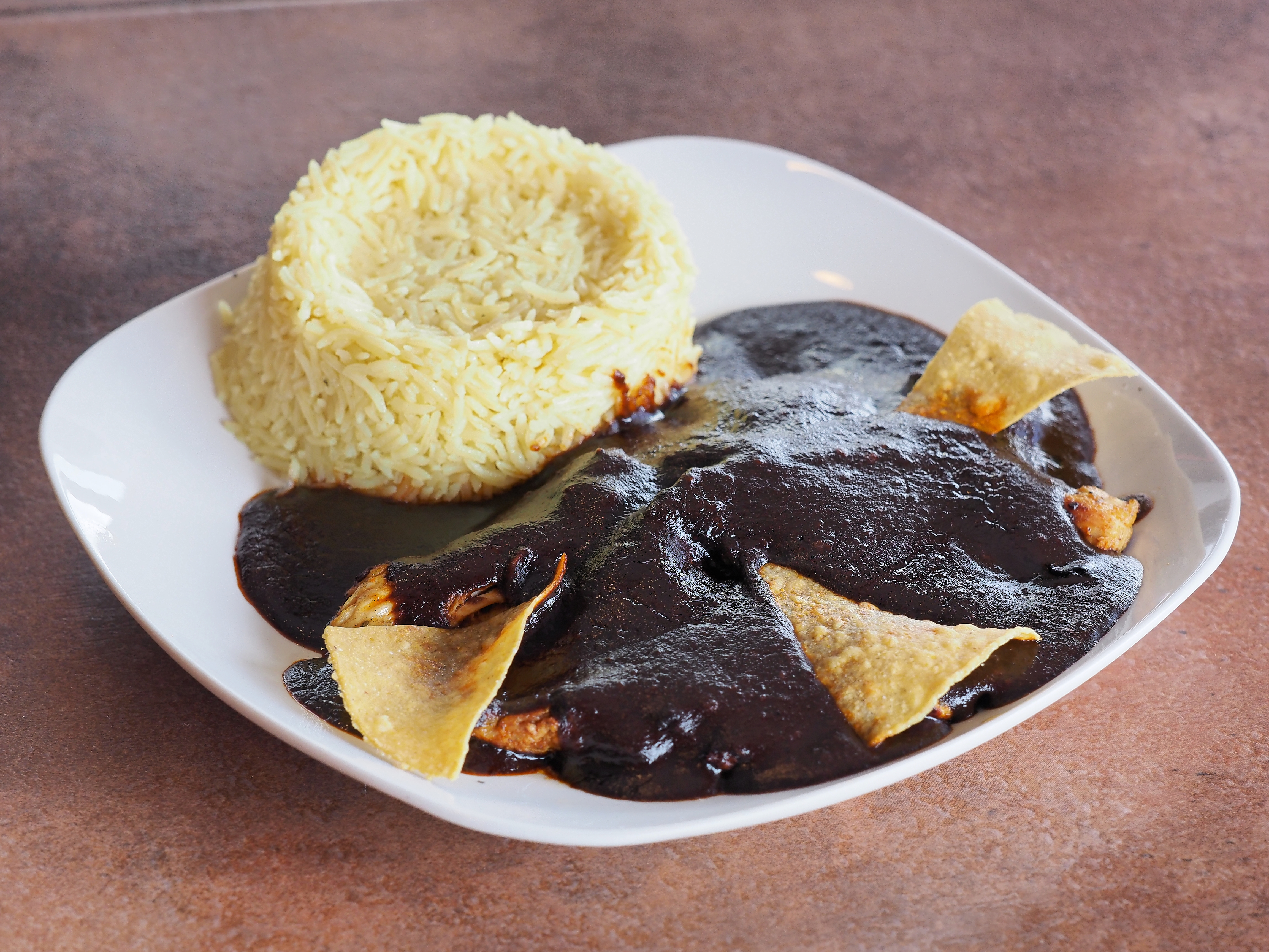 Order Mole Poblano food online from Dulcinea Bar And Grill store, Gaithersburg on bringmethat.com