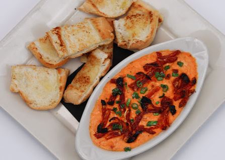 Order Sundried Tomato Dip food online from High Top Grub & Pub store, Fort Worth on bringmethat.com