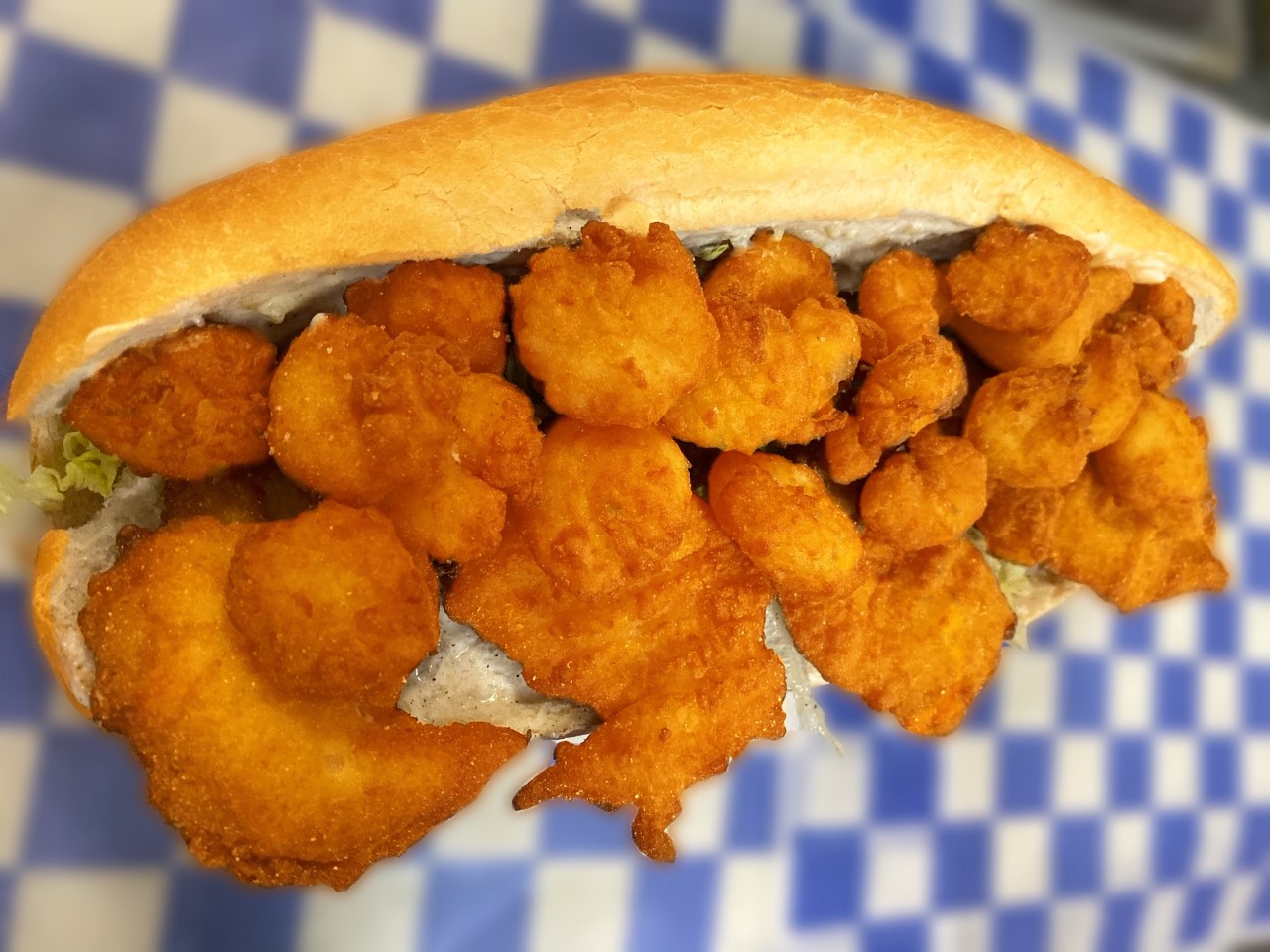 Order Create Your Own Seafood Po-Boy food online from Village Pizza & Seafood store, Santa Fe on bringmethat.com