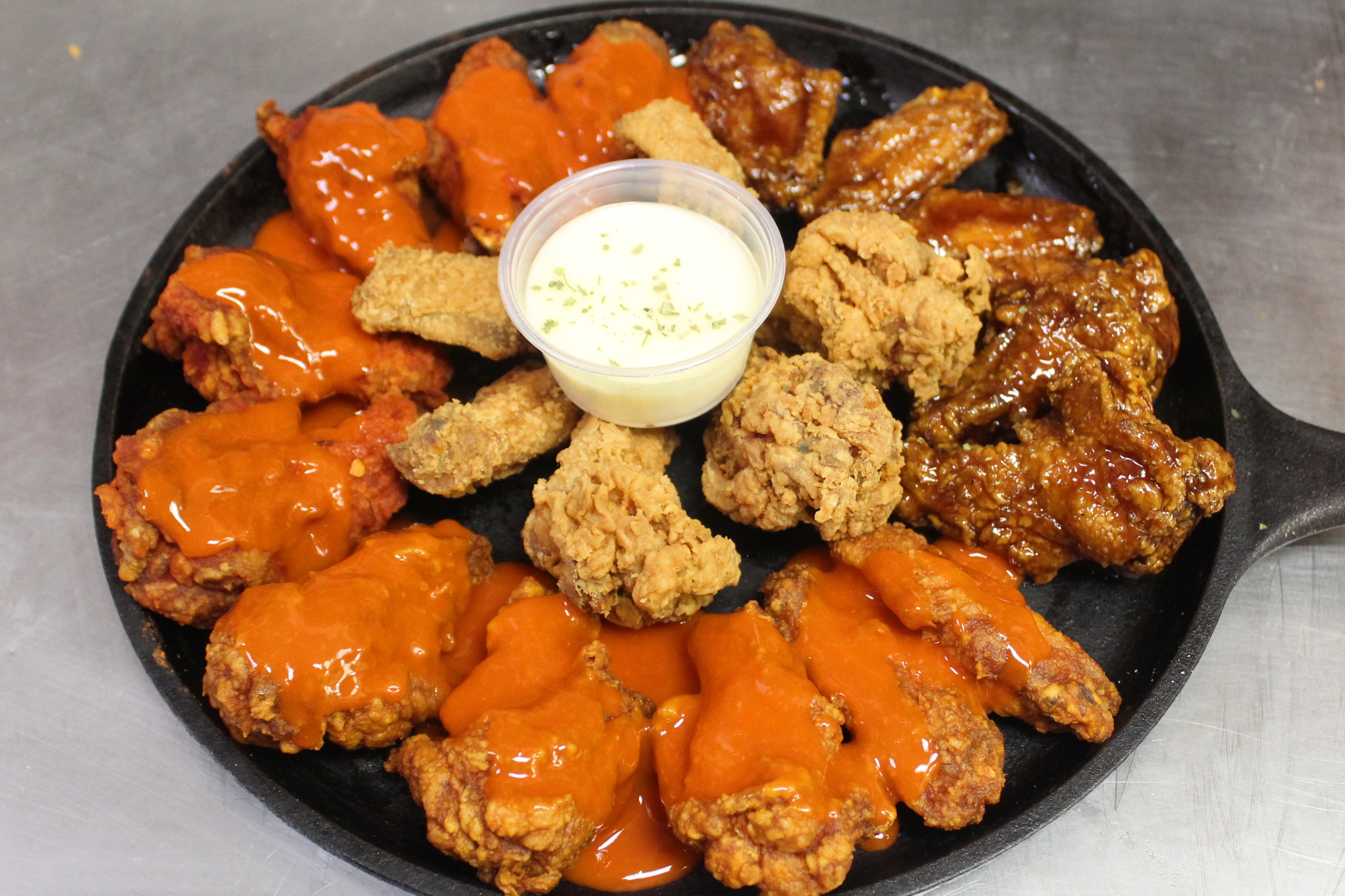 Order 10 Bone-In Wings food online from Charleigh B Chicken & Fish store, Kansas City on bringmethat.com