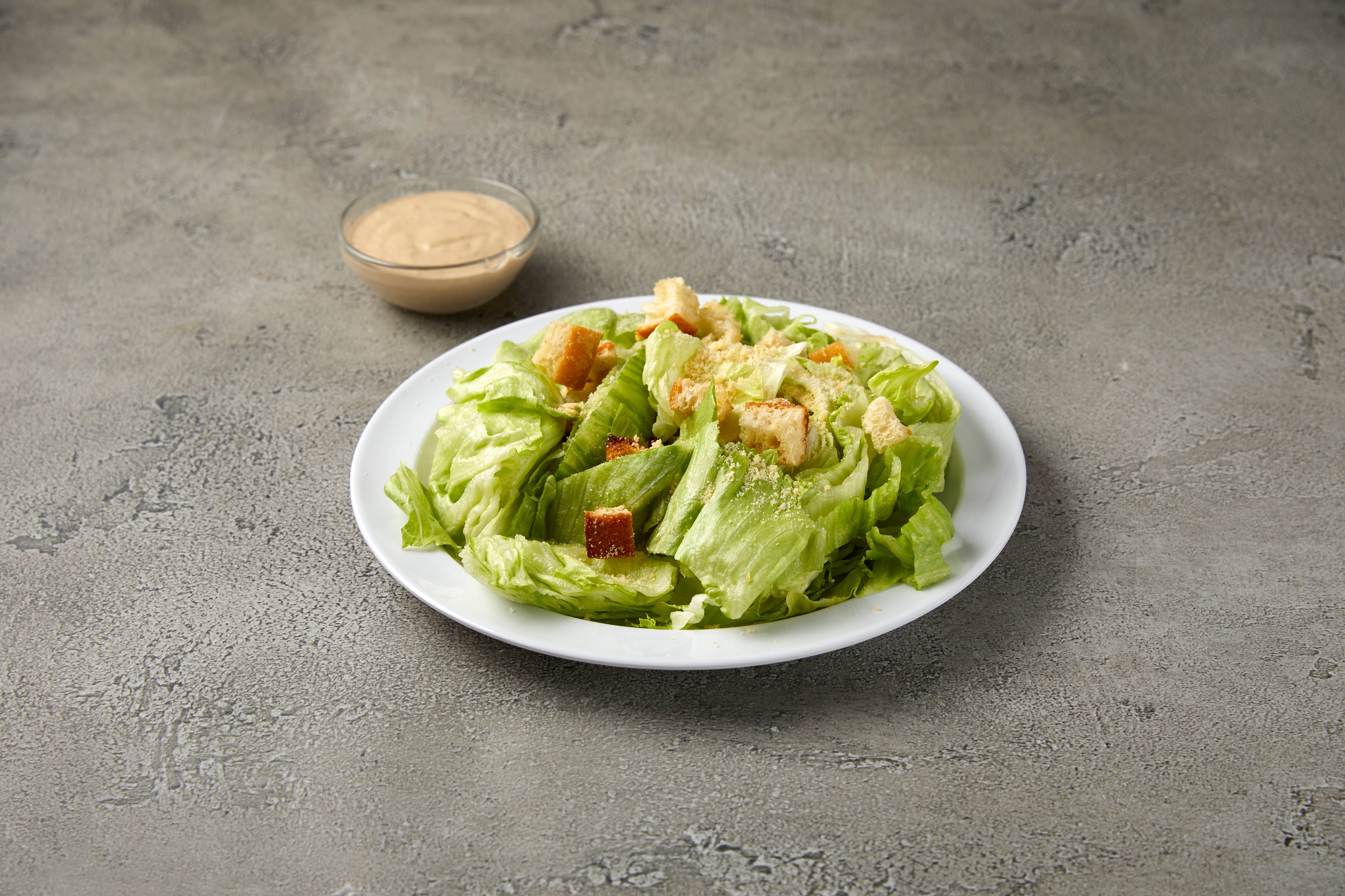 Order Caesar Salad food online from Roma Deli & Restaurant store, Las Vegas on bringmethat.com