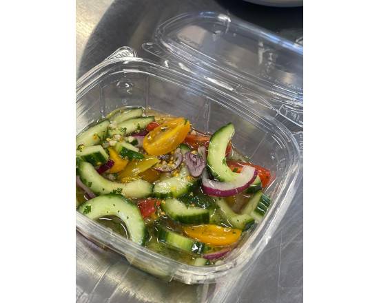 Order Cucumber and tomato salad  food online from Rudine’s Kitchen store, Tyrone on bringmethat.com