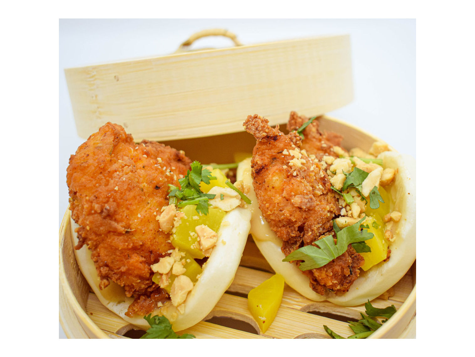 Order Fried Chicken Bao food online from Dumplings Of Fury store, Hilliard on bringmethat.com