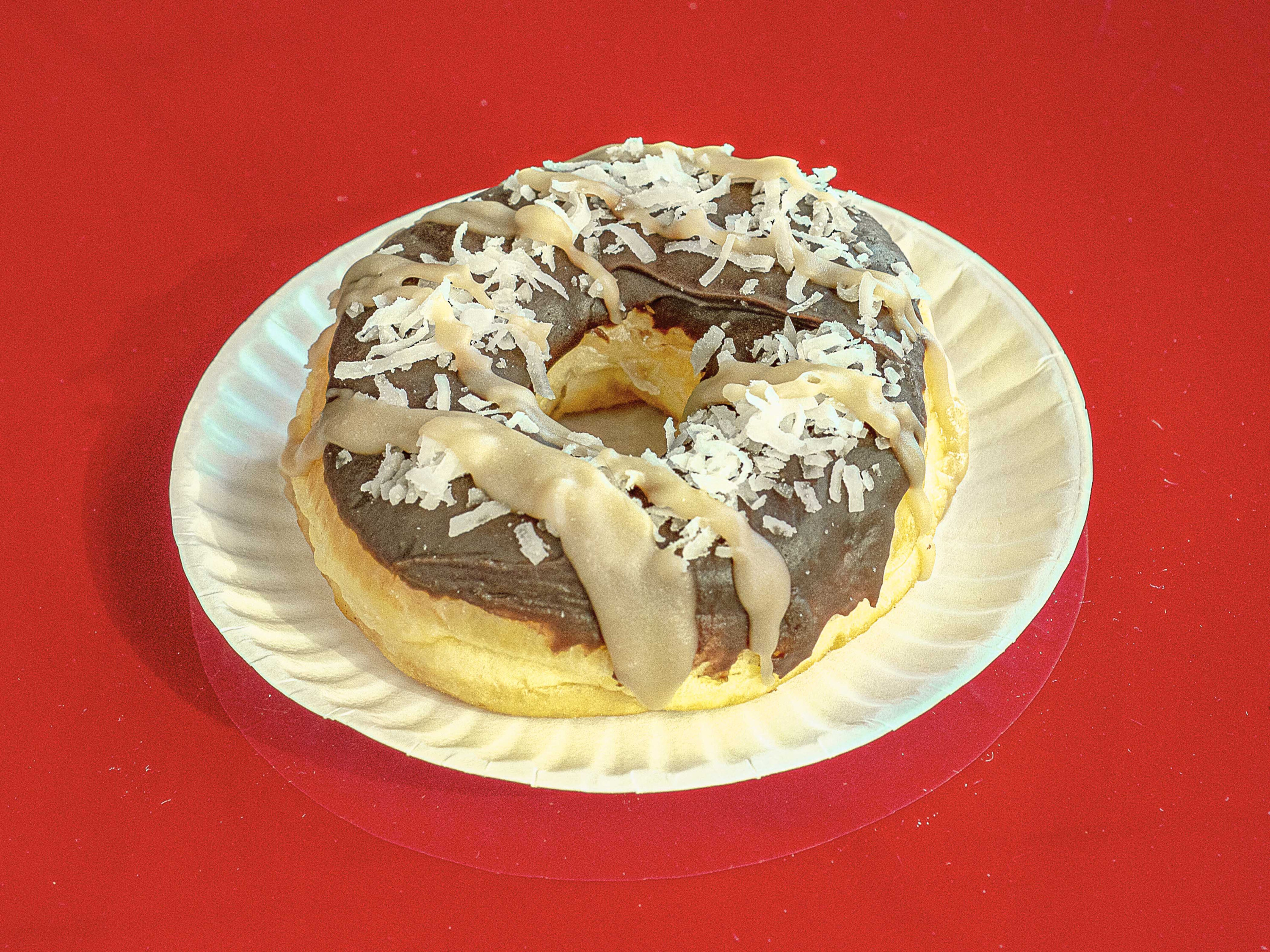 Order The Samoanut Donut food online from Hammer Donuts store, West Lafayette on bringmethat.com