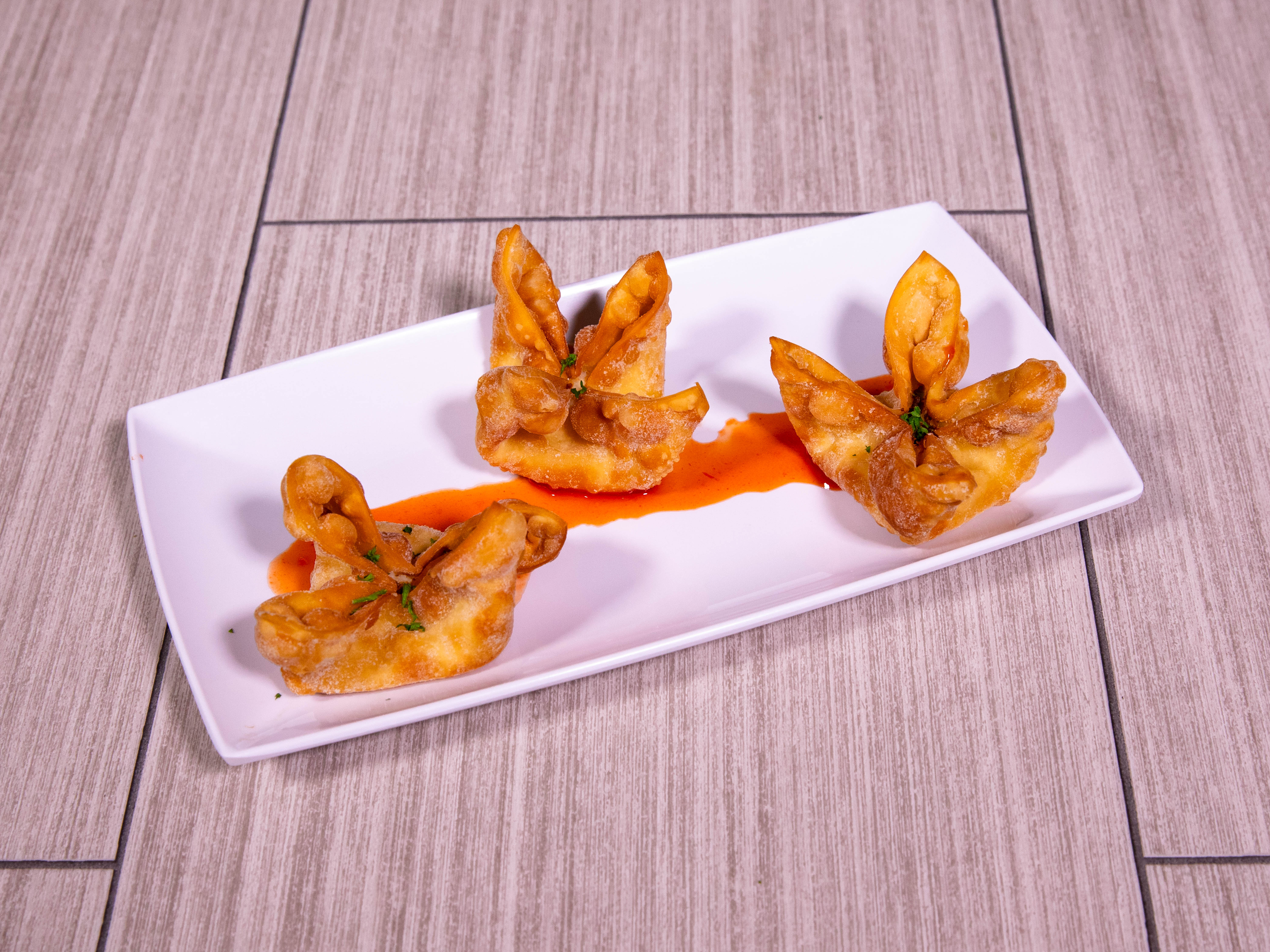 Order 208. Six Pieces Crab Rangoon food online from China Pavillion Restaurant store, Irving on bringmethat.com