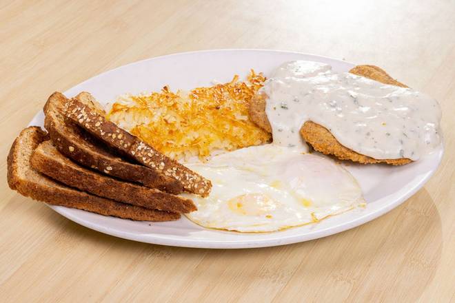Order Country Fried Steak & Eggs* food online from Shari'S Cafe store, McMinnville on bringmethat.com