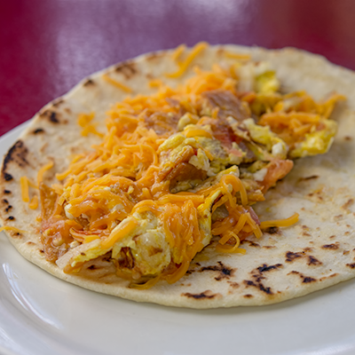Order Chilaquiles Taco food online from The Hut Diner store, San Antonio on bringmethat.com