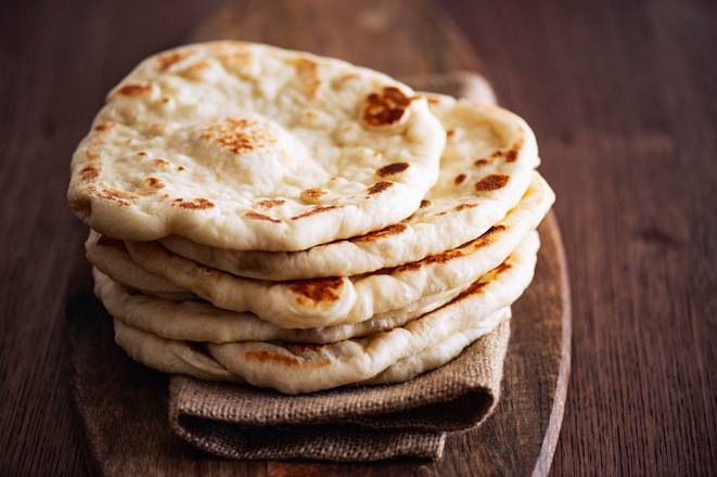 Order Plain Naan food online from Spice Of America store, San Francisco on bringmethat.com