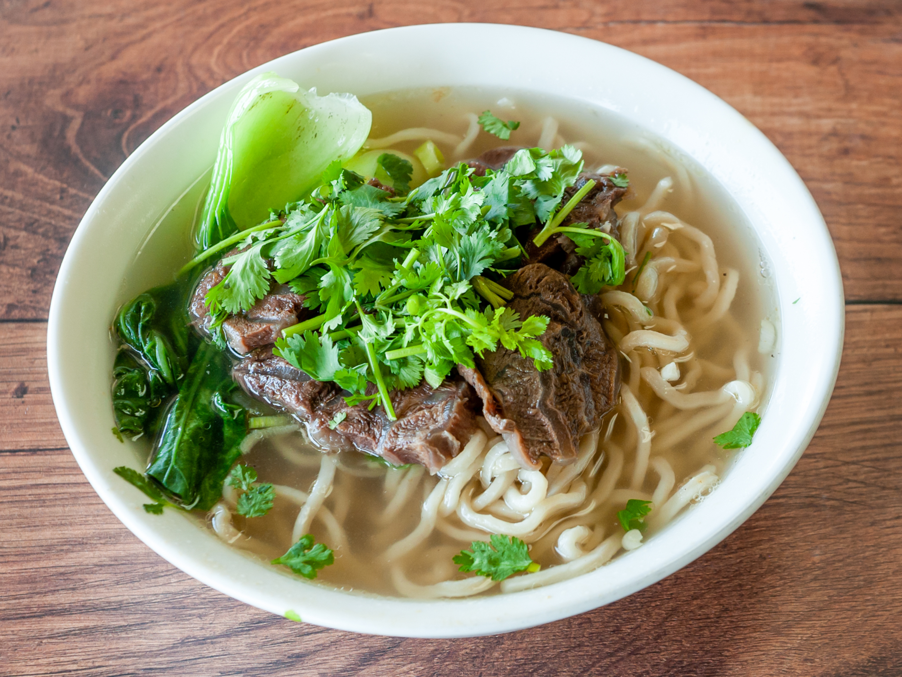 Order Beef Noodle Soup(thick or thin) 清燉牛肉面 food online from Asj Restaurant store, San Jose on bringmethat.com