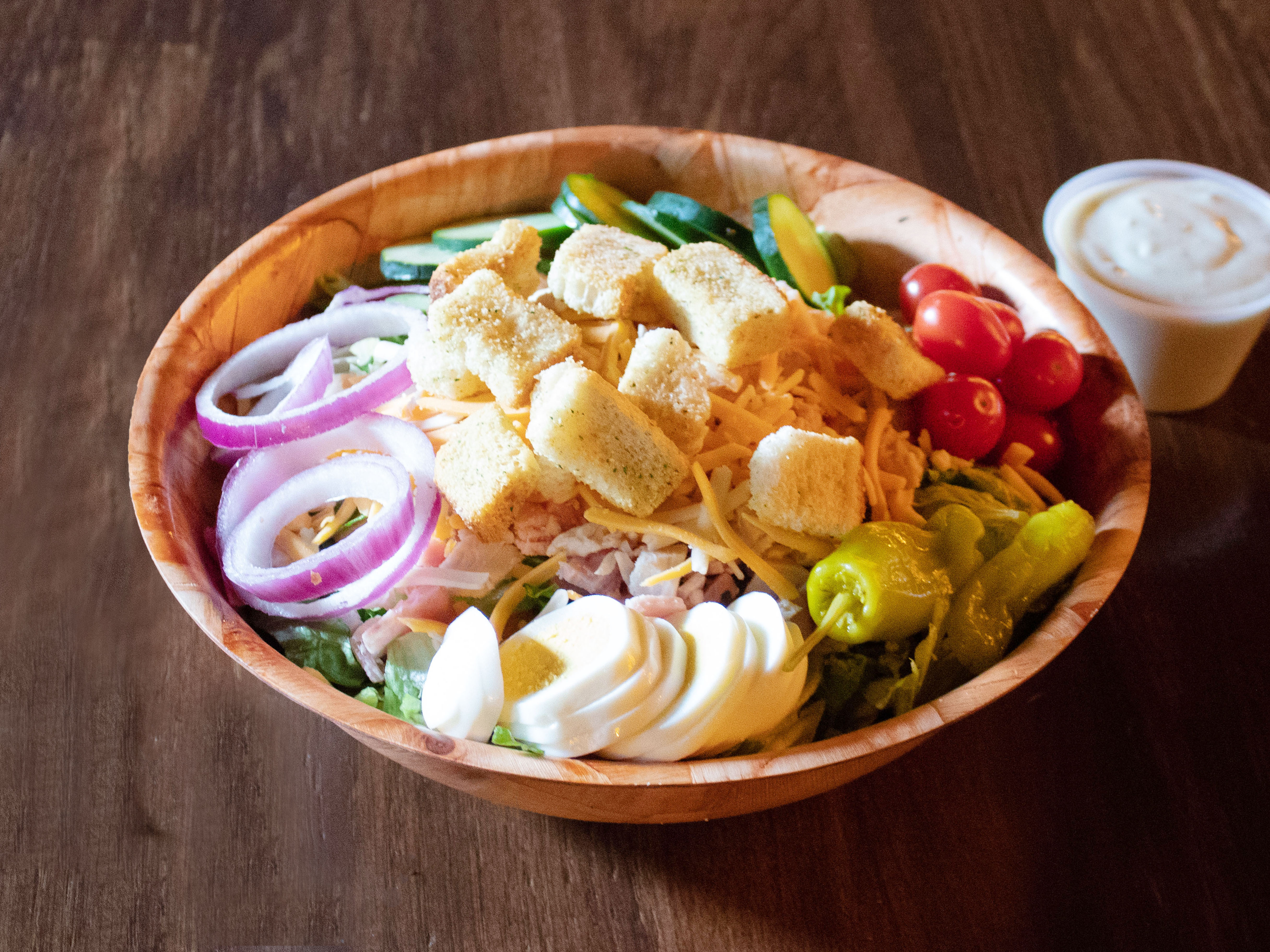 Order Large Dinner Salad food online from Barnaby's Pizza store, South Bend on bringmethat.com