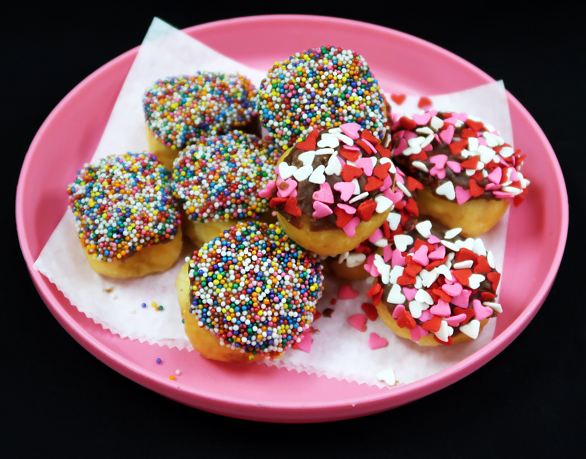 Order Chocolate Glazed with Sprinkles Donut Holes food online from Bedford Hello Donuts store, Bedford on bringmethat.com