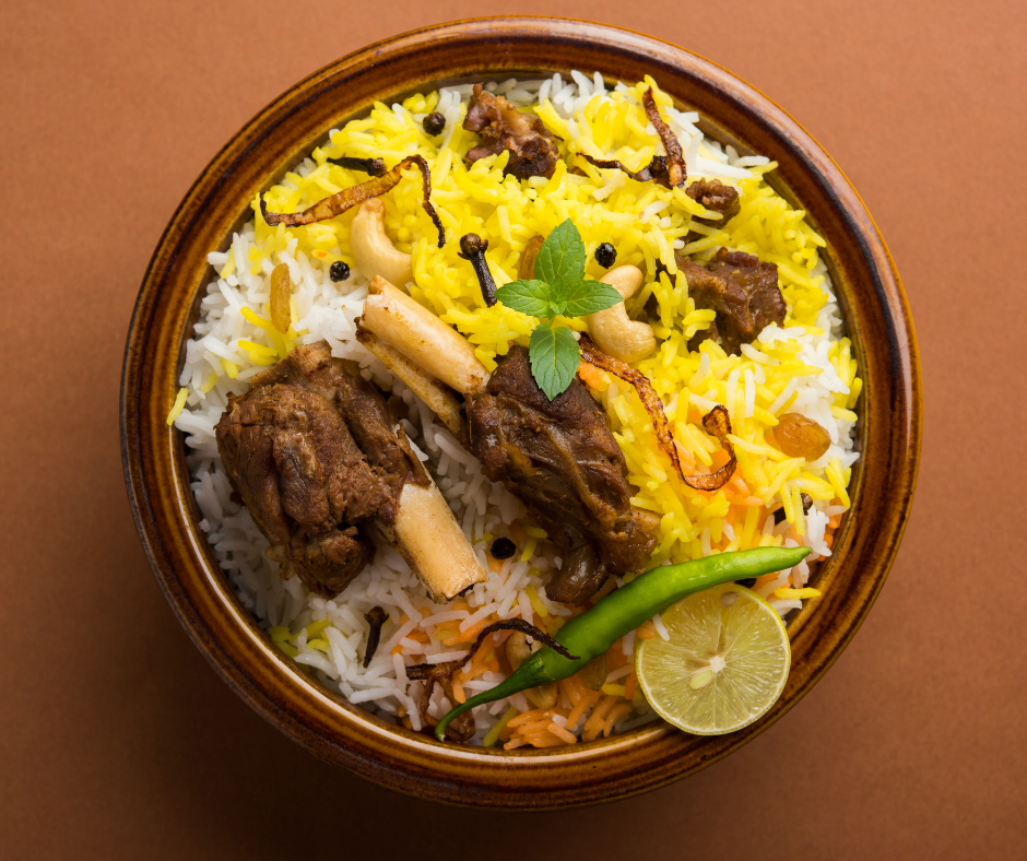 Order Goat Biriyani (+ Free Dessert) food online from Spices Of India Kitchen store, Irving on bringmethat.com