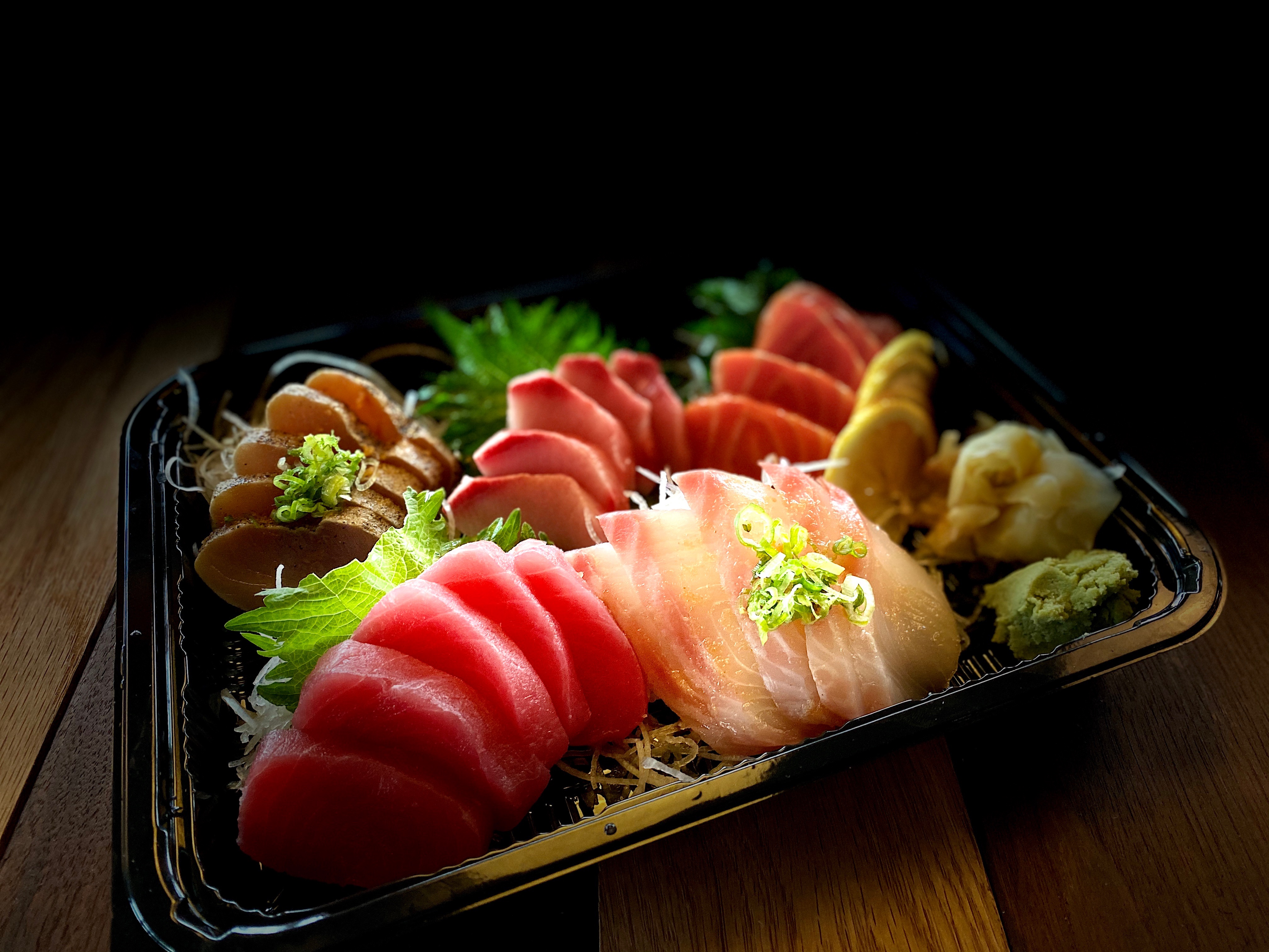 Order Sashimi Deluxe food online from Miyoshi Japanese Restaurant store, Bakersfield on bringmethat.com