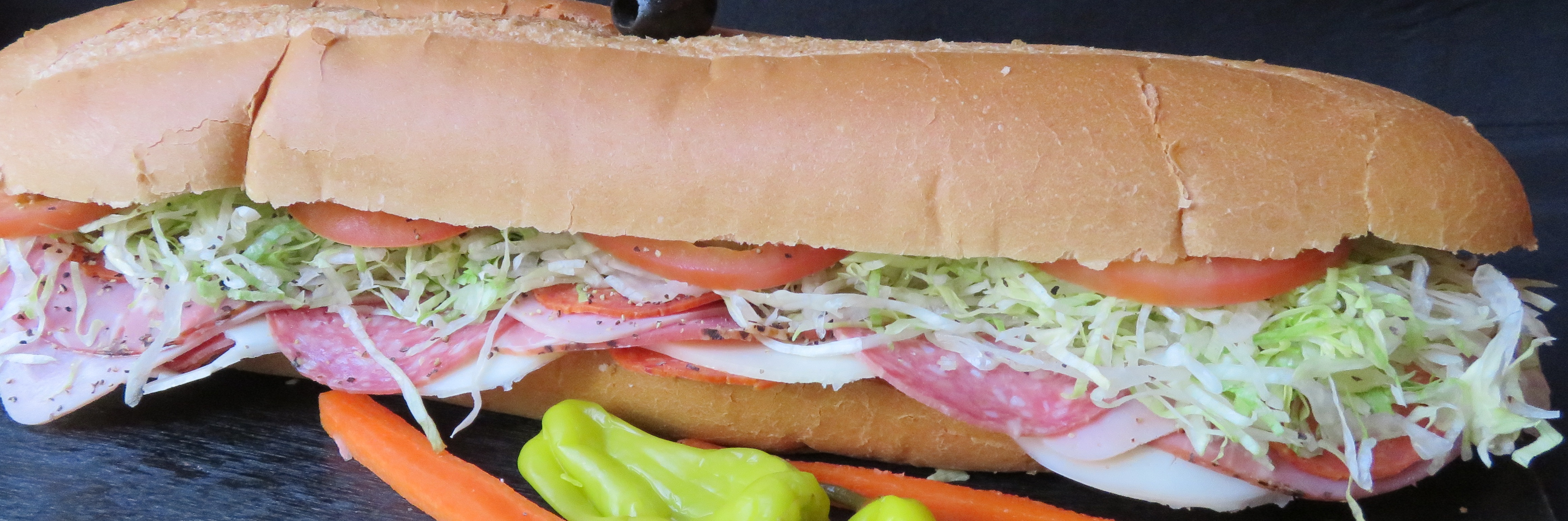 Order The Big Dude Sub food online from The Sub Station store, Riverside on bringmethat.com