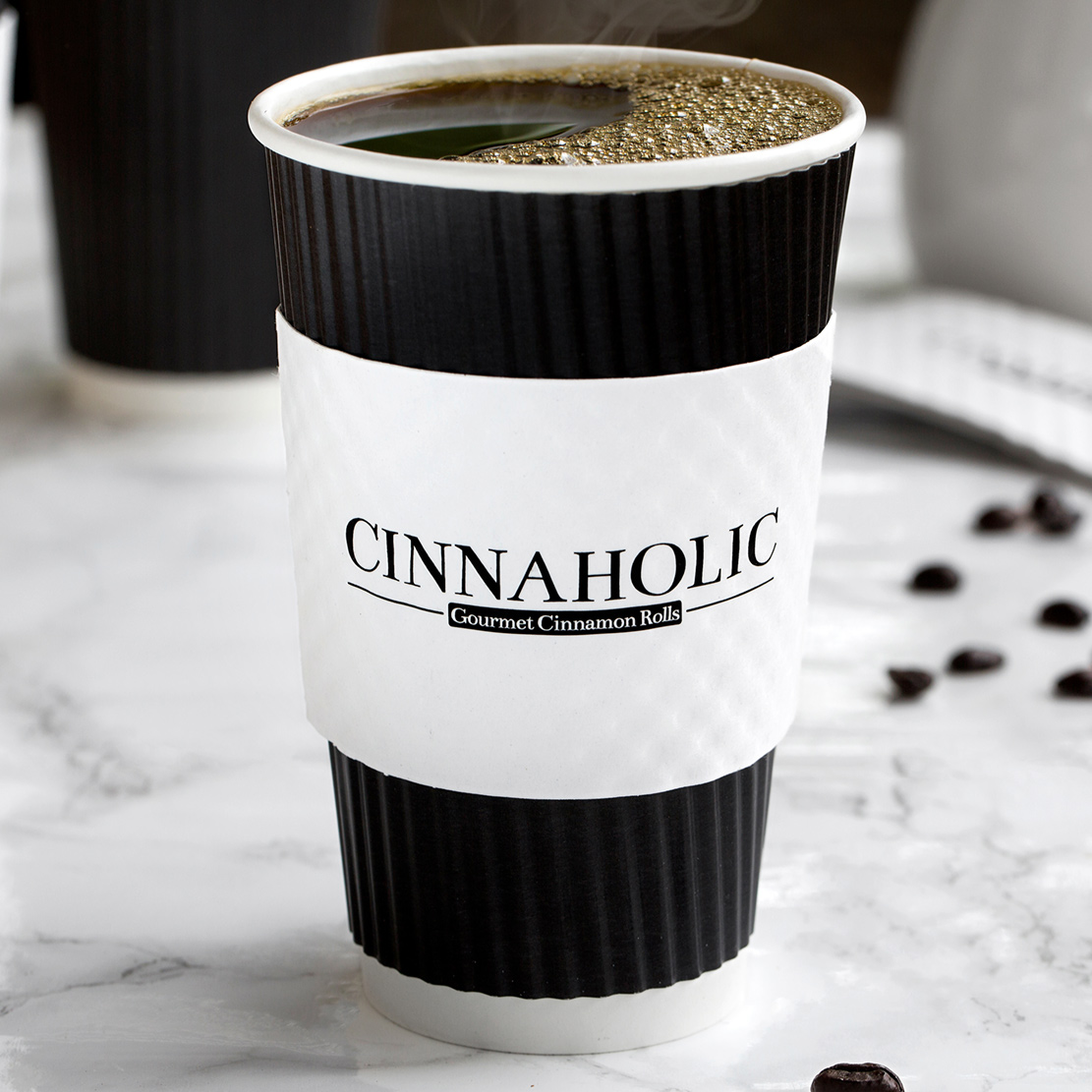 Order 16 Oz. Coffee food online from Cinnaholic store, Schaumburg on bringmethat.com