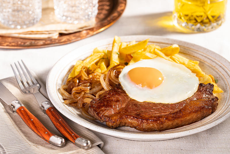 Order Bife a Cavalo / Beef with egg on top  food online from Bacalhau Grill store, San Jose on bringmethat.com