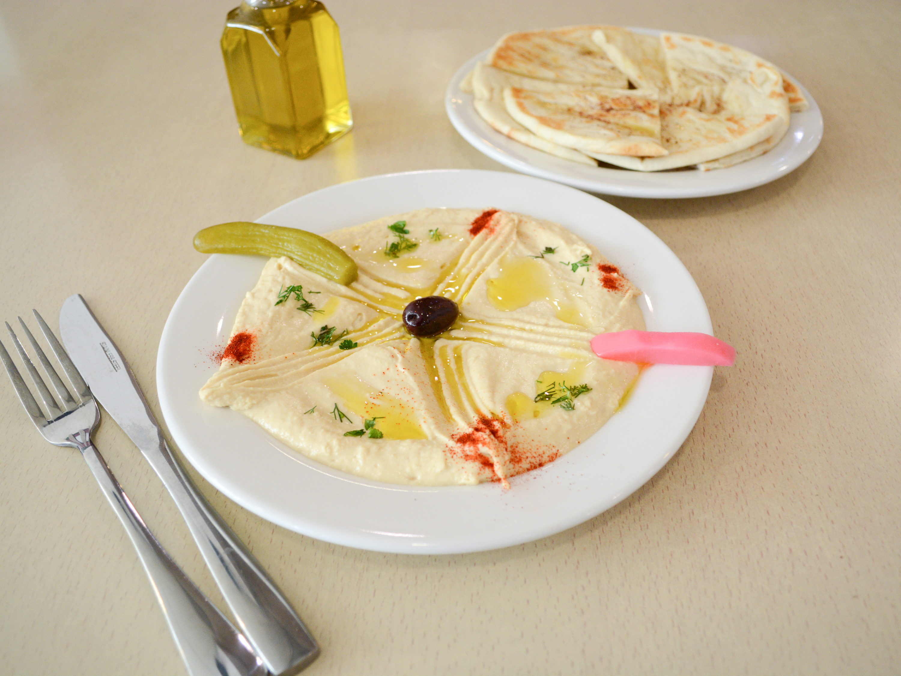 Order 23. Hummus and 2 Pita food online from Mint & Olives store, Seattle on bringmethat.com