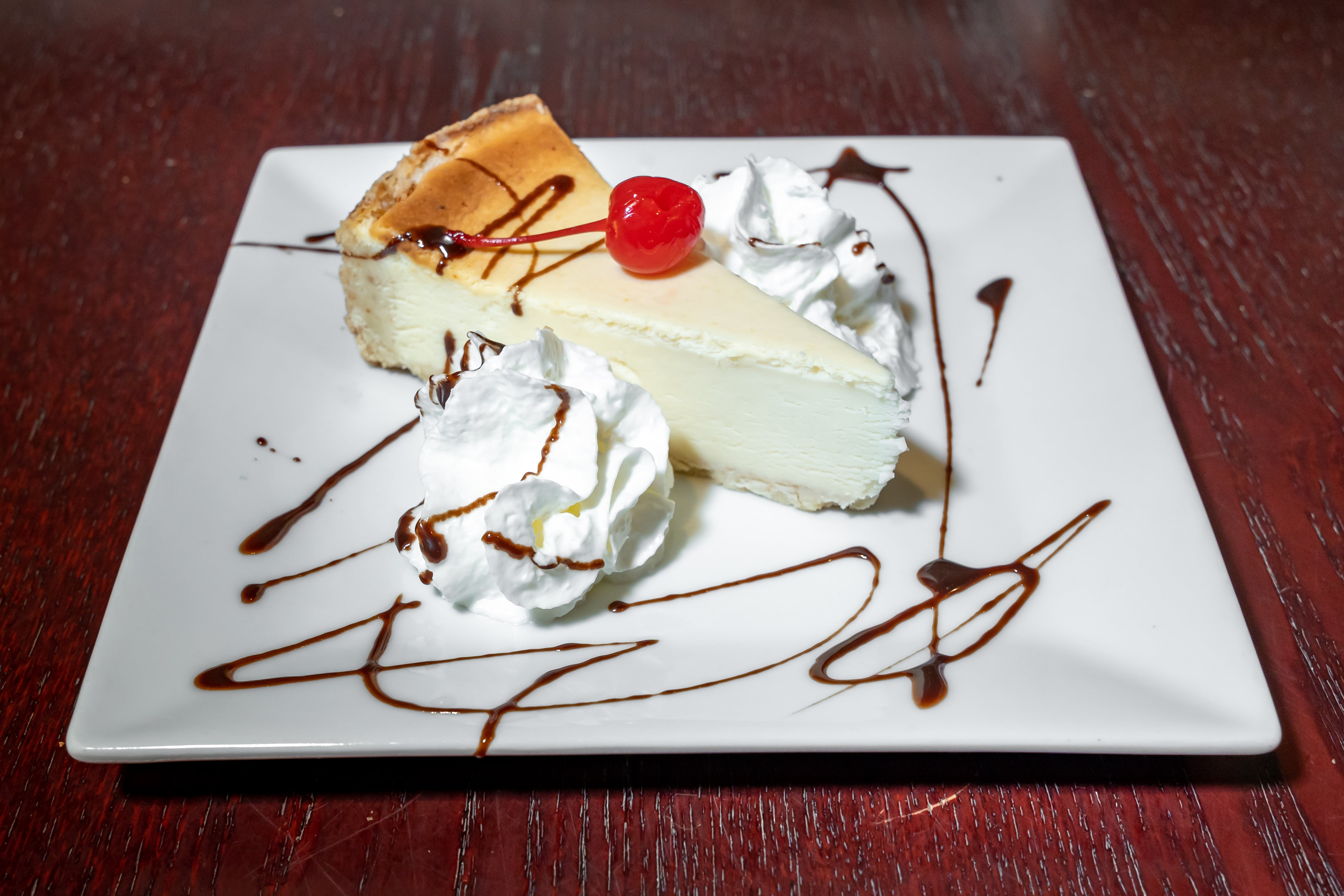 Order NY Style Cheesecake - Dessert food online from Zegarellis Restaurant store, Brewster on bringmethat.com