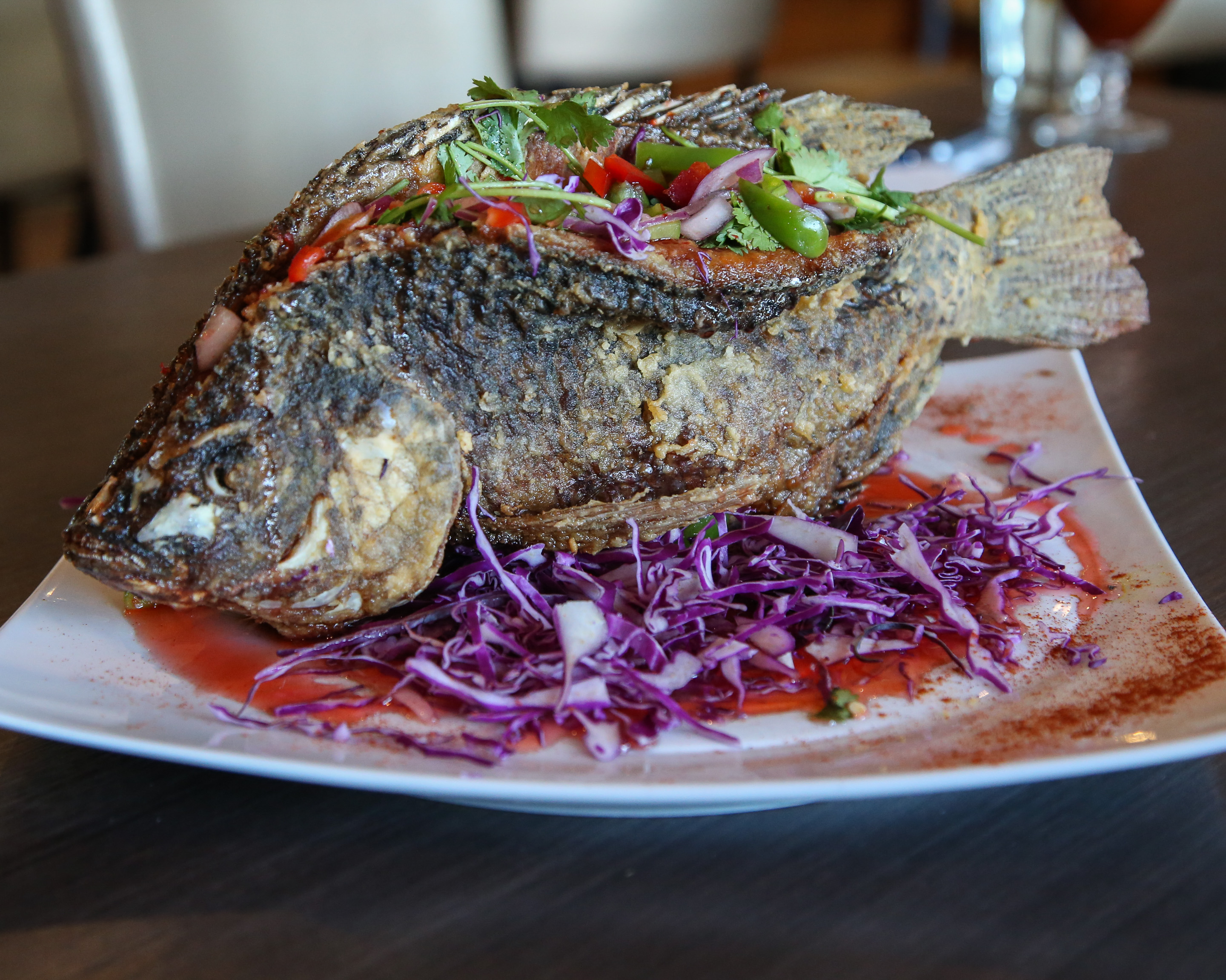 Order Whole Tilapia with Chili Sauce food online from Amazing Thai Restaurant store, North Las Vegas on bringmethat.com