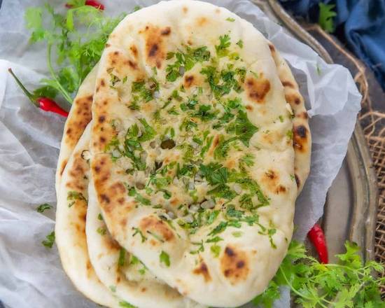 Order Garlic Naan food online from Rasoi Fusion Indian Cuisine store, Roswell on bringmethat.com