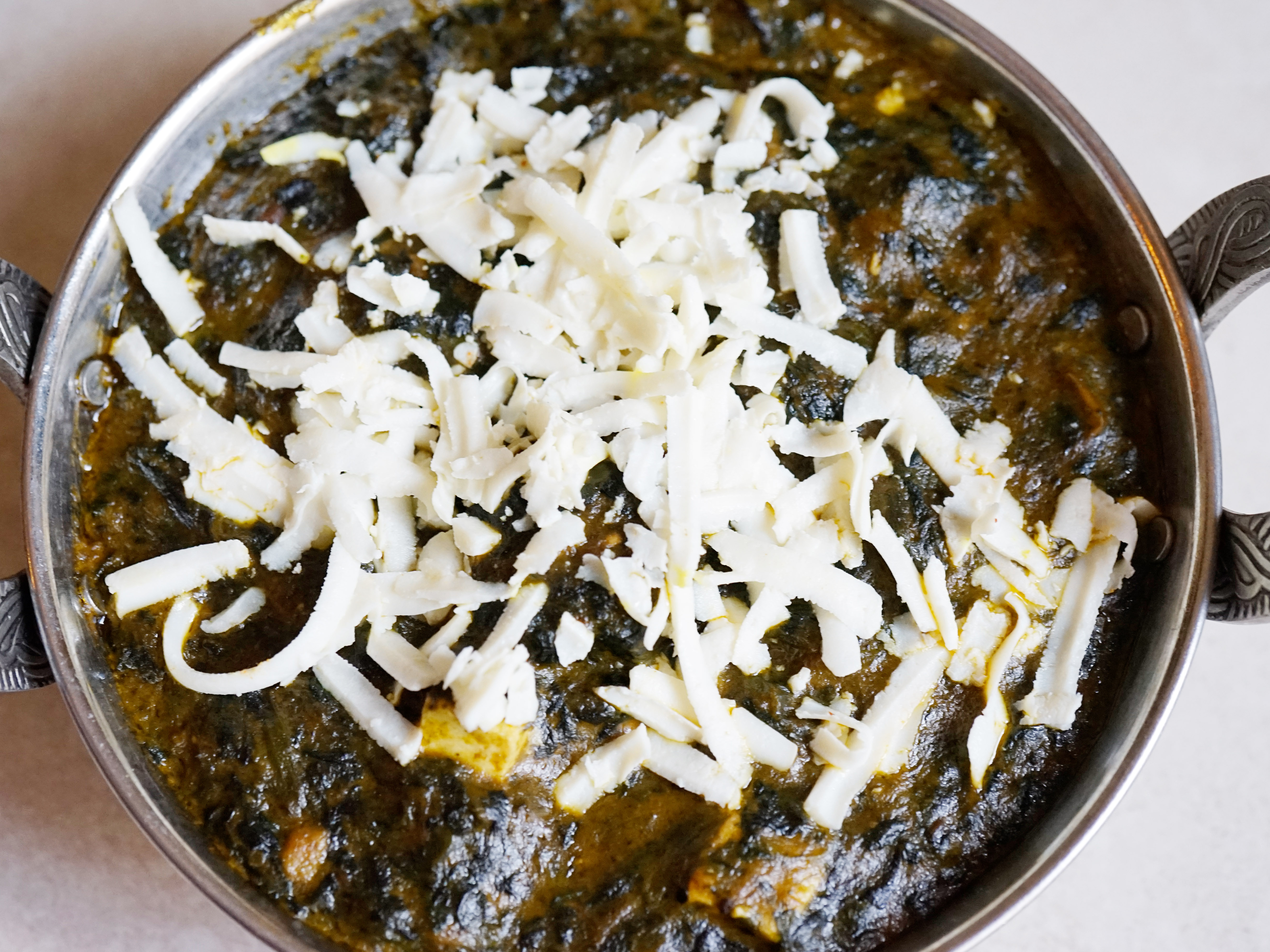Order Saag Paneer food online from Rangoli Indian Cuisine store, New York on bringmethat.com