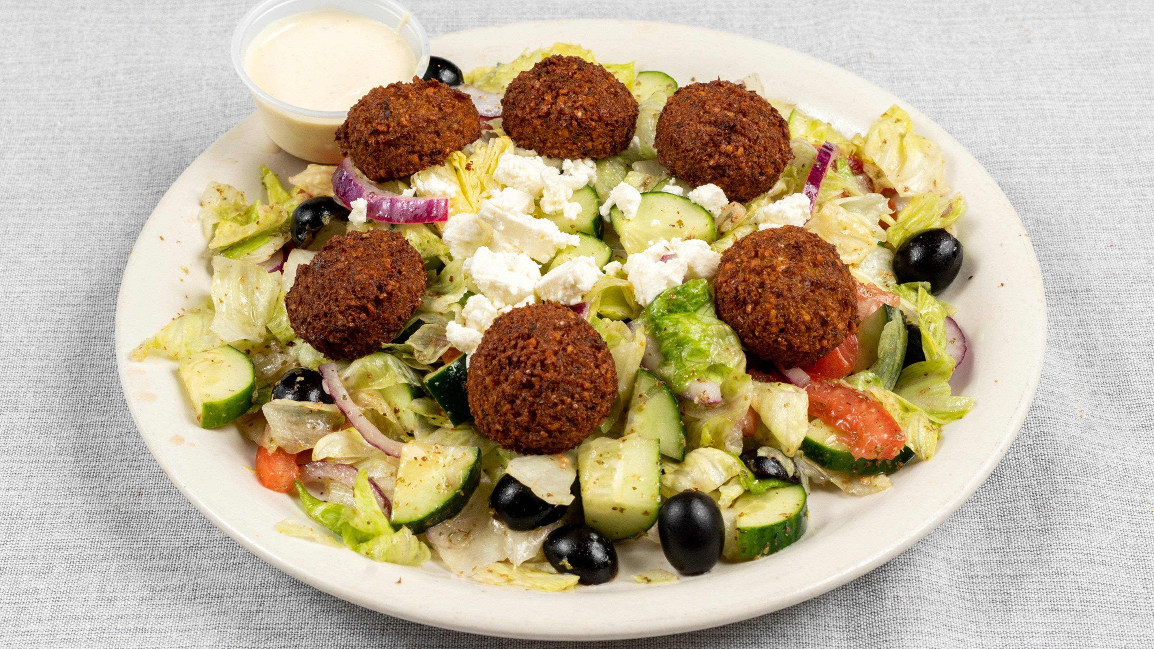 Order falafel salad  food online from Sahara Restaurant store, Indianapolis on bringmethat.com