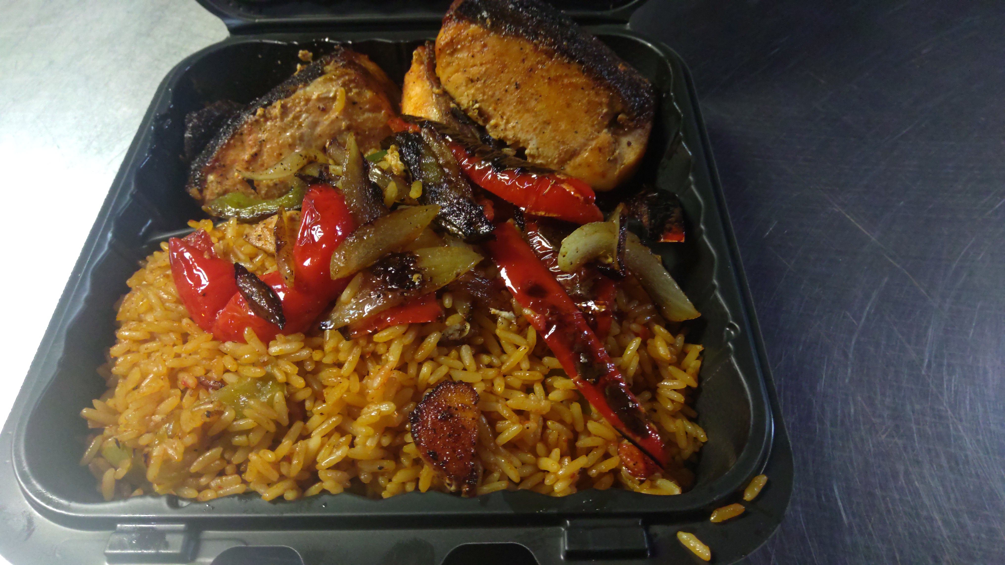 Order 2c. Rice with Peppered African Chicken  food online from Africana Cuisine store, Perry Hall on bringmethat.com