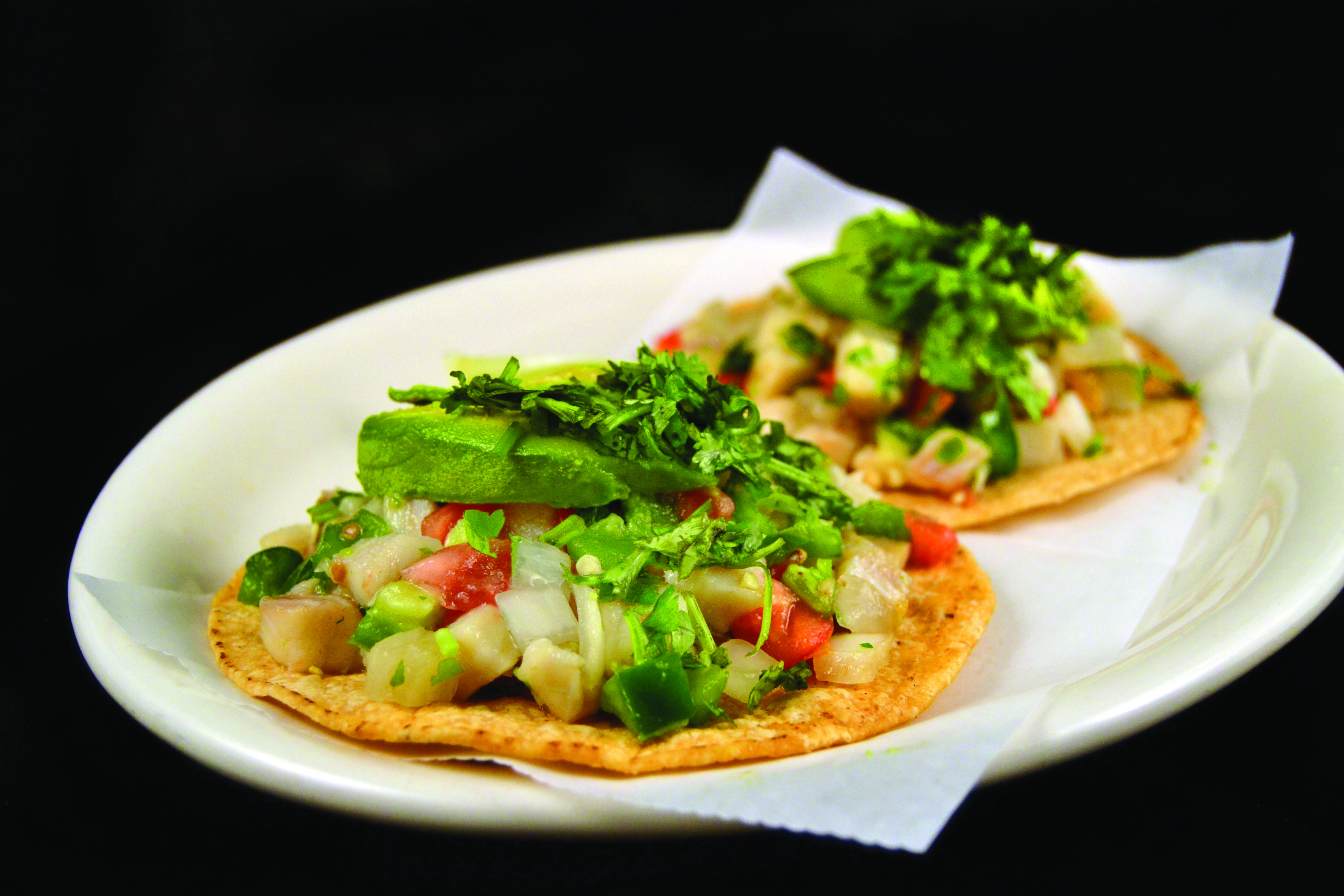 Order Tostadas de Ceviche food online from Mi Comal Mexican Restaurant store, Irving on bringmethat.com