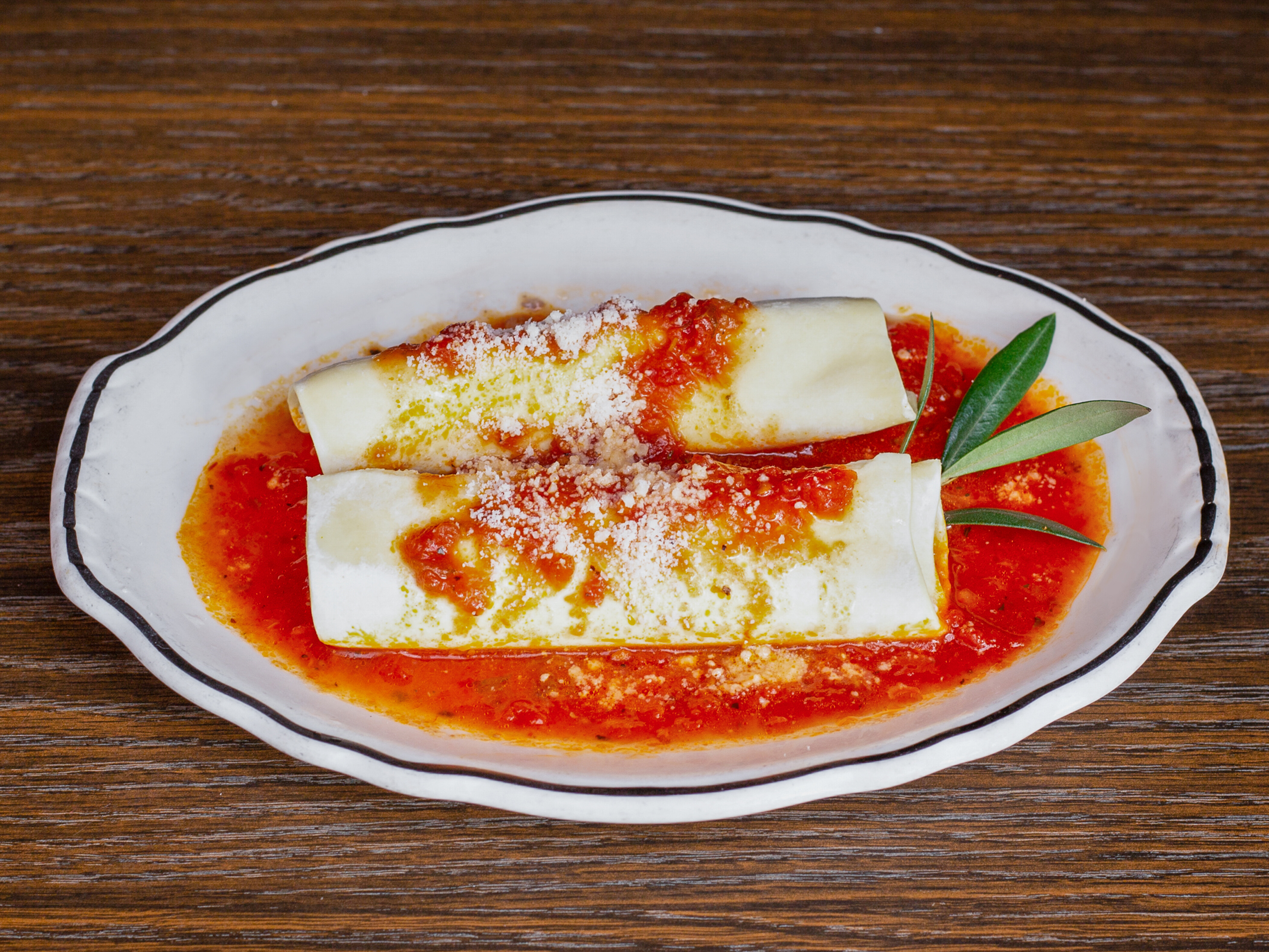 Order Baked Manicotti food online from Marios store, Dubuque on bringmethat.com